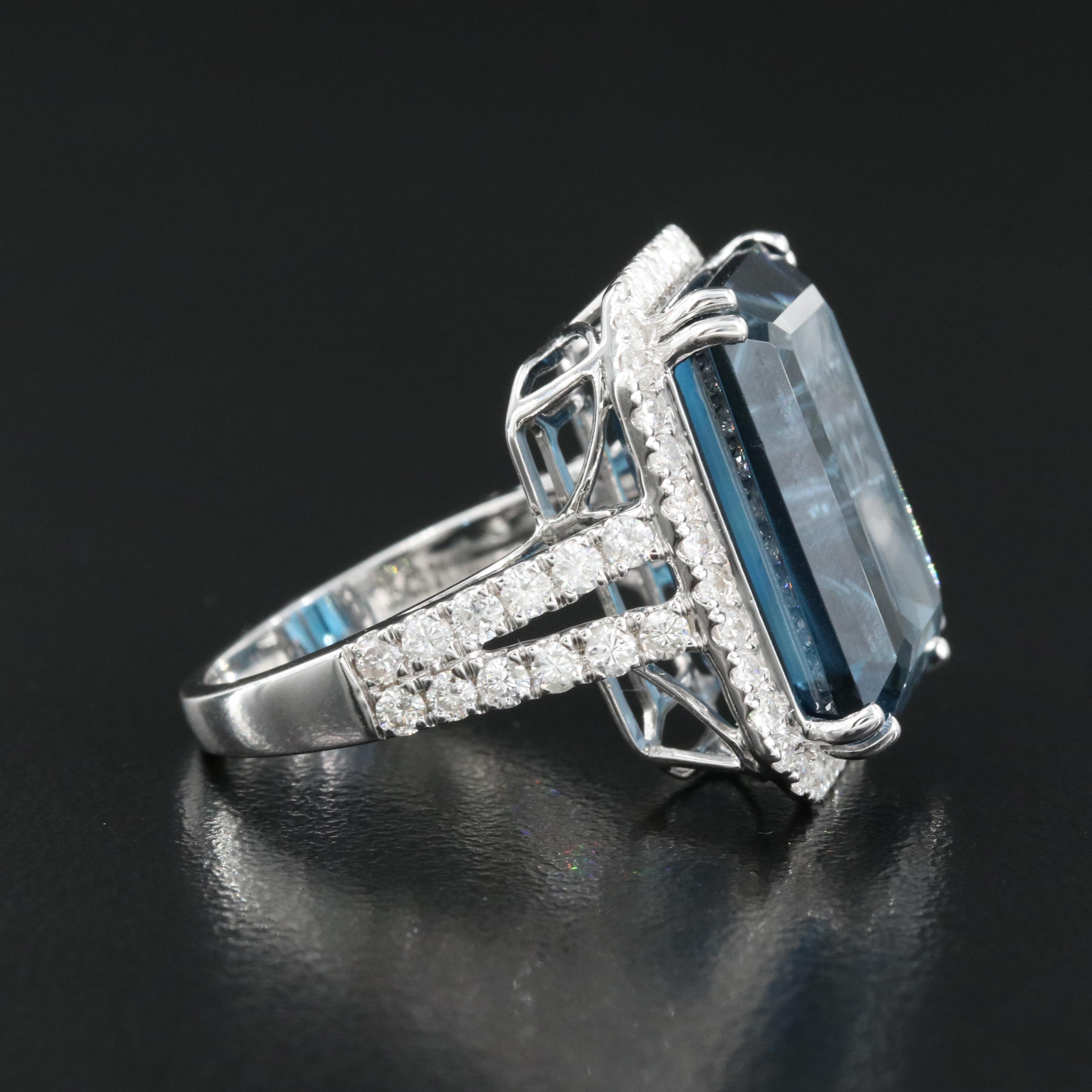 14K 21.18 CT London Blue Topaz and 1.35 CTW Diamond Halo Ring