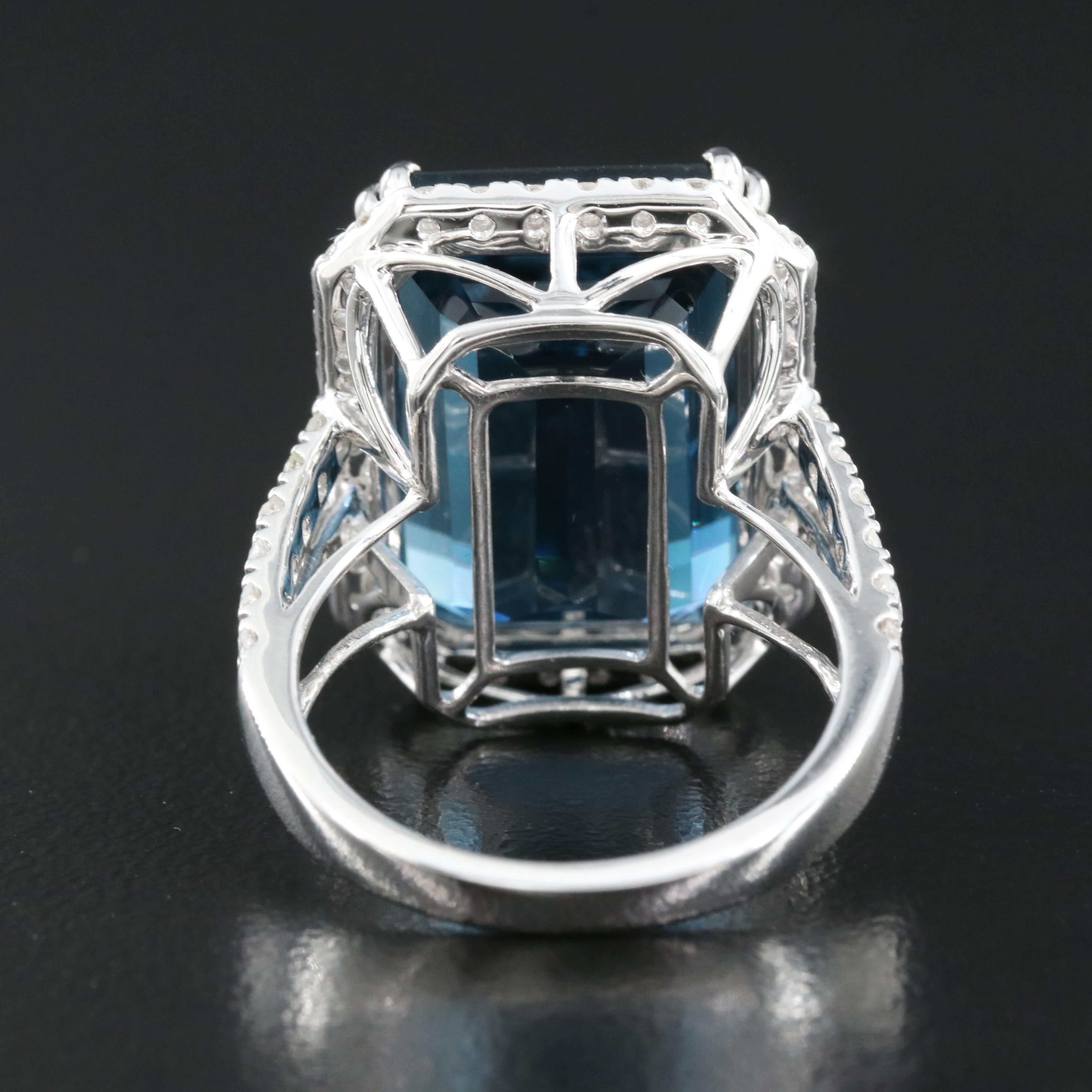 14K 21.18 CT London Blue Topaz and 1.35 CTW Diamond Halo Ring