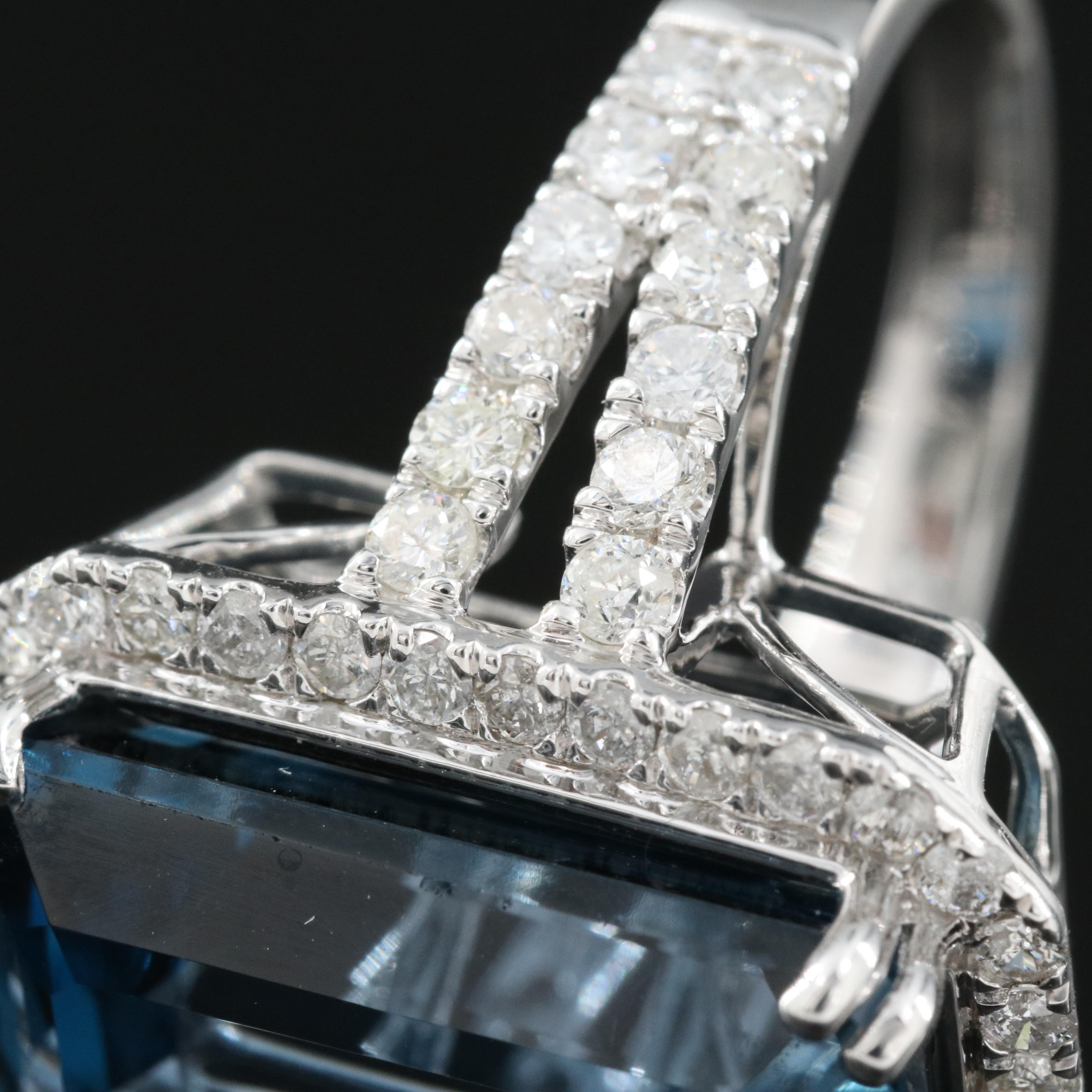 14K 21.18 CT London Blue Topaz and 1.35 CTW Diamond Halo Ring