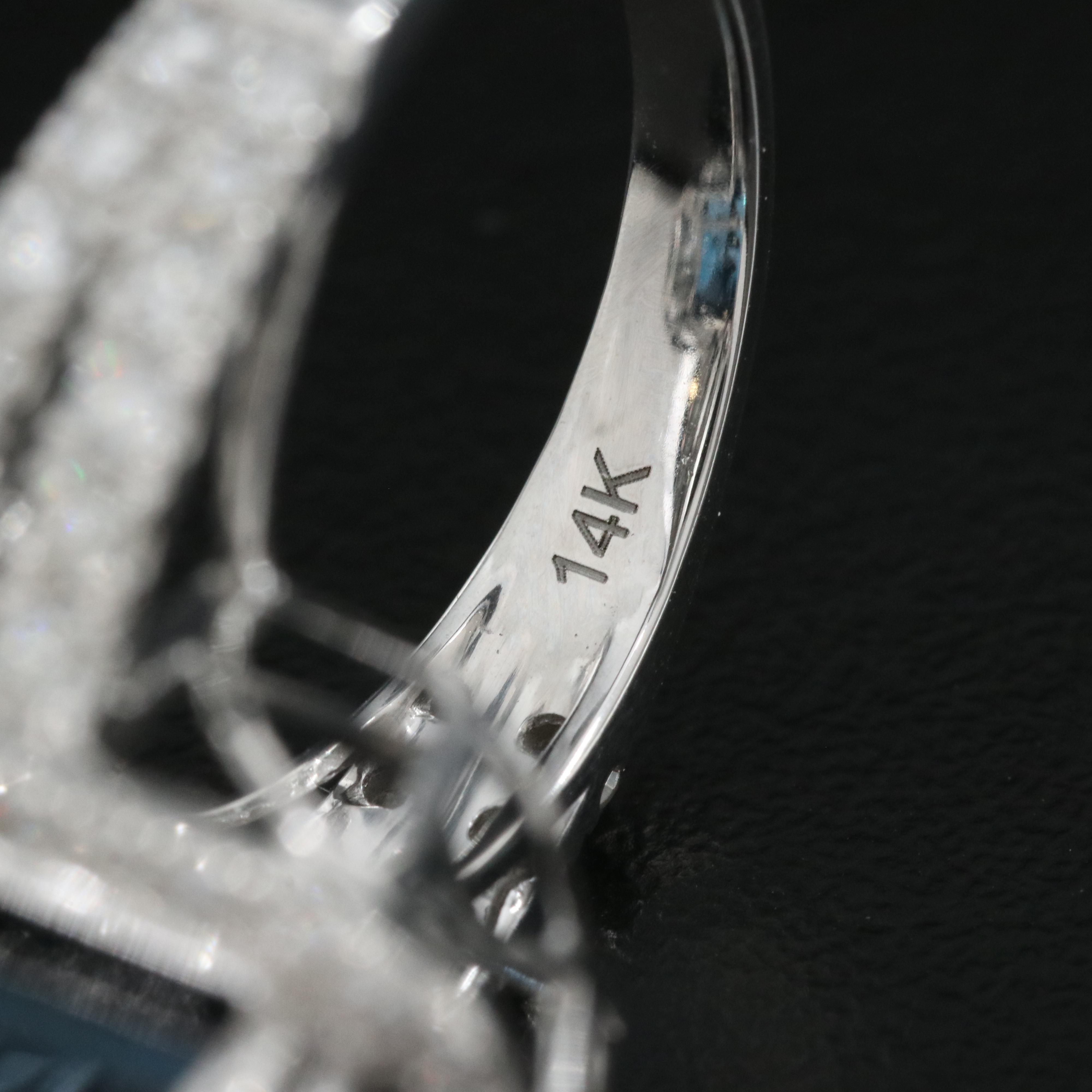 14K 21.18 CT London Blue Topaz and 1.35 CTW Diamond Halo Ring