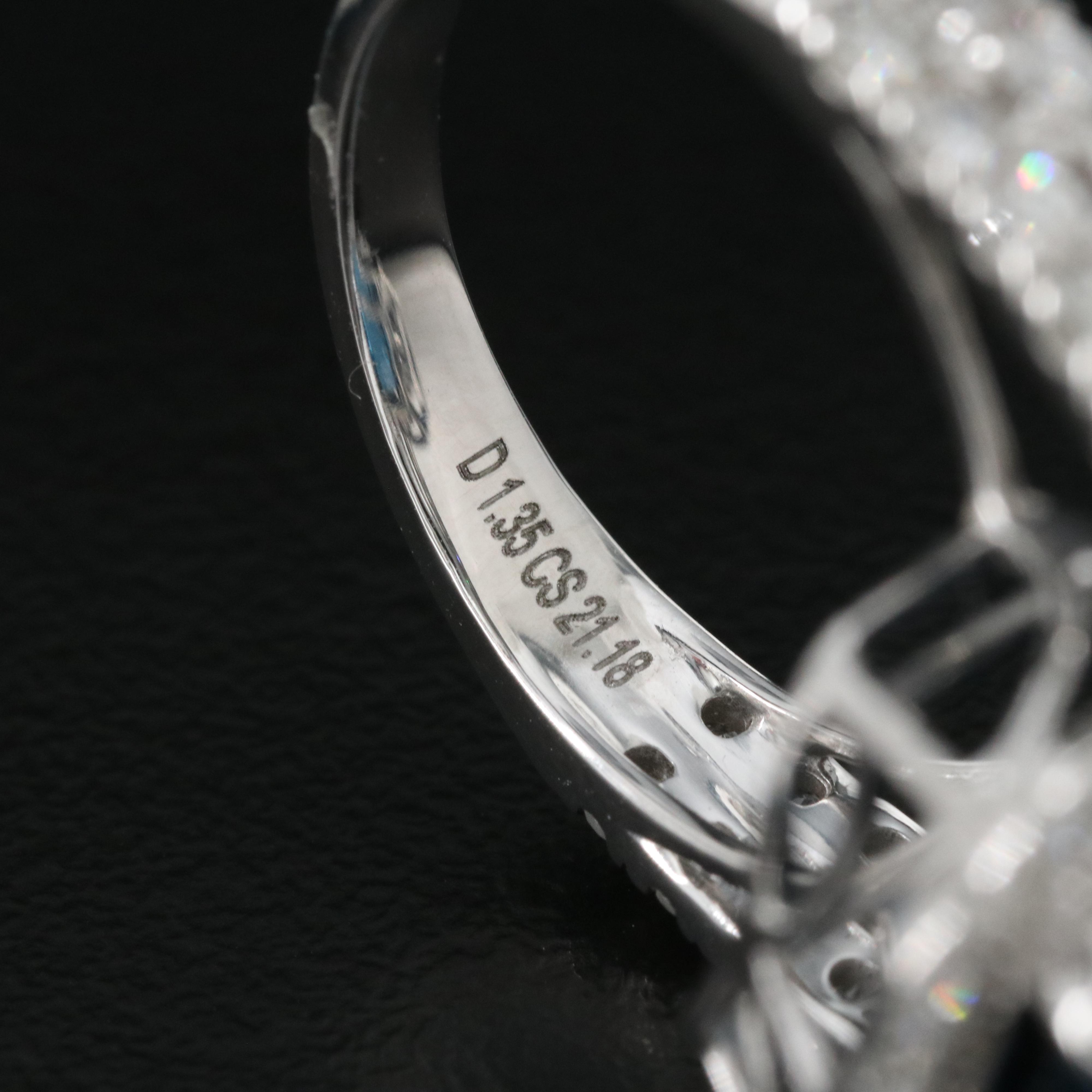 14K 21.18 CT London Blue Topaz and 1.35 CTW Diamond Halo Ring