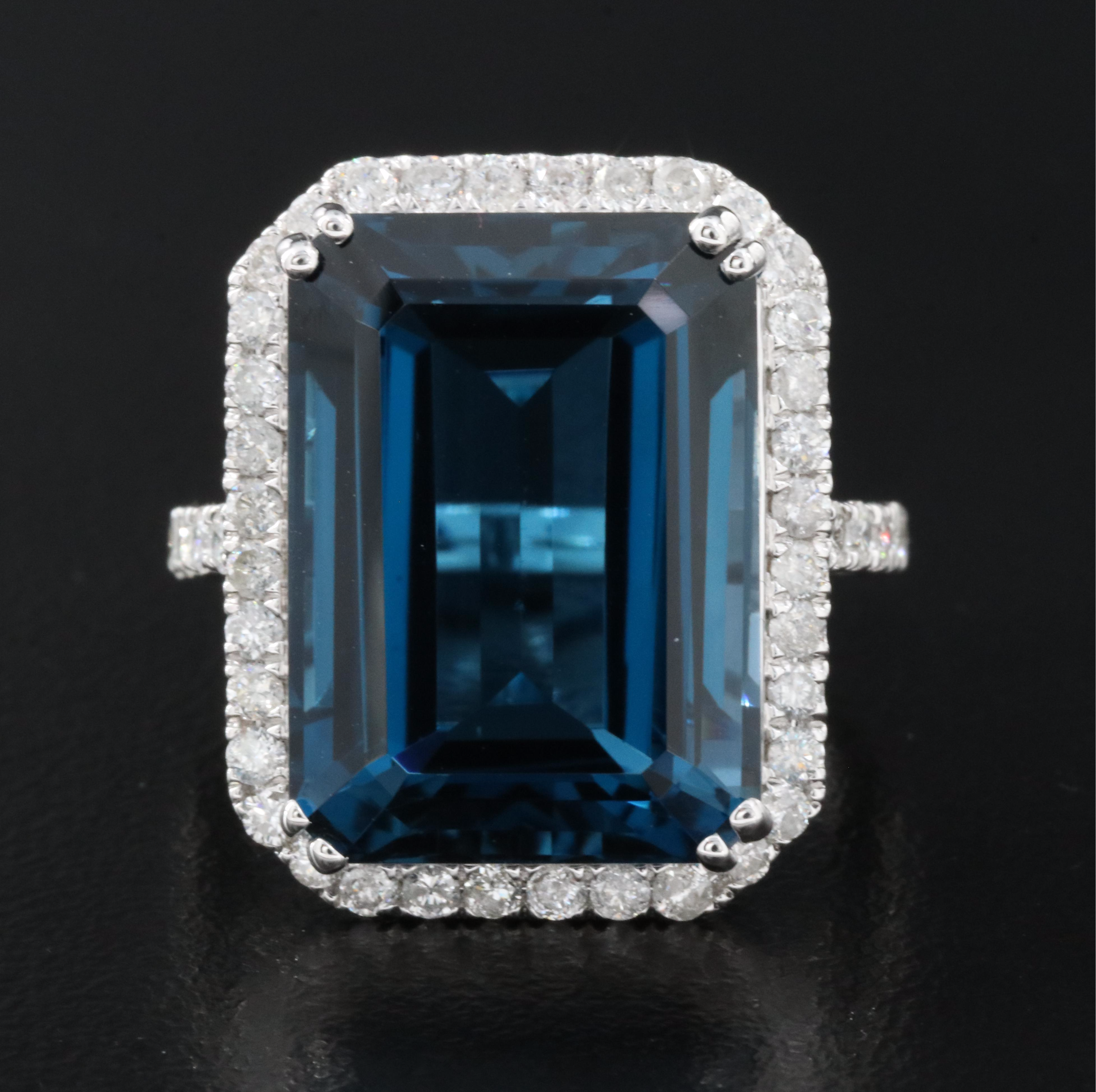 14K 21.18 CT London Blue Topaz and 1.06 CTW Diamond Halo Ring