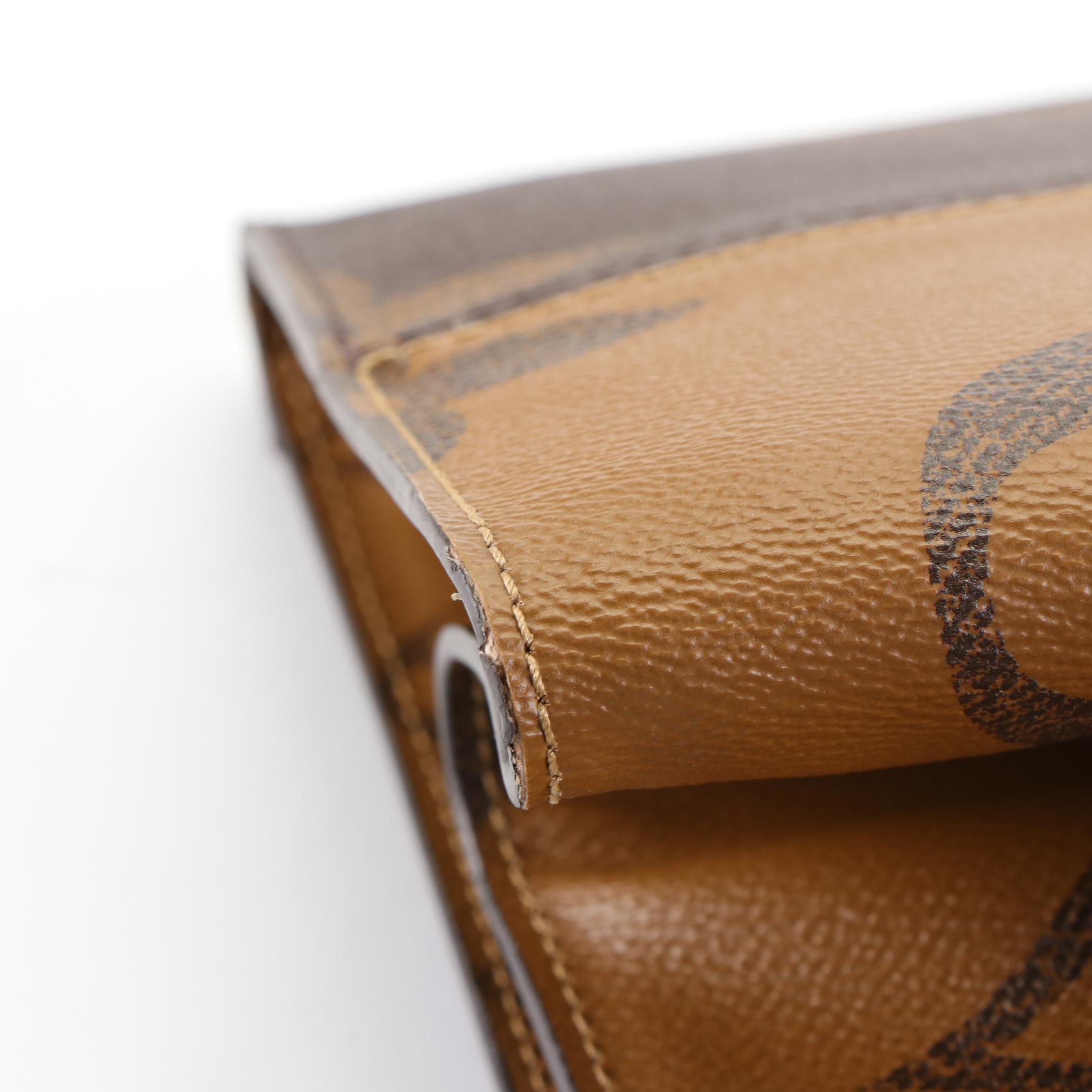 Louis Vuitton Onthego GM Tote Bag in Monogram Giant Reverse Canvas