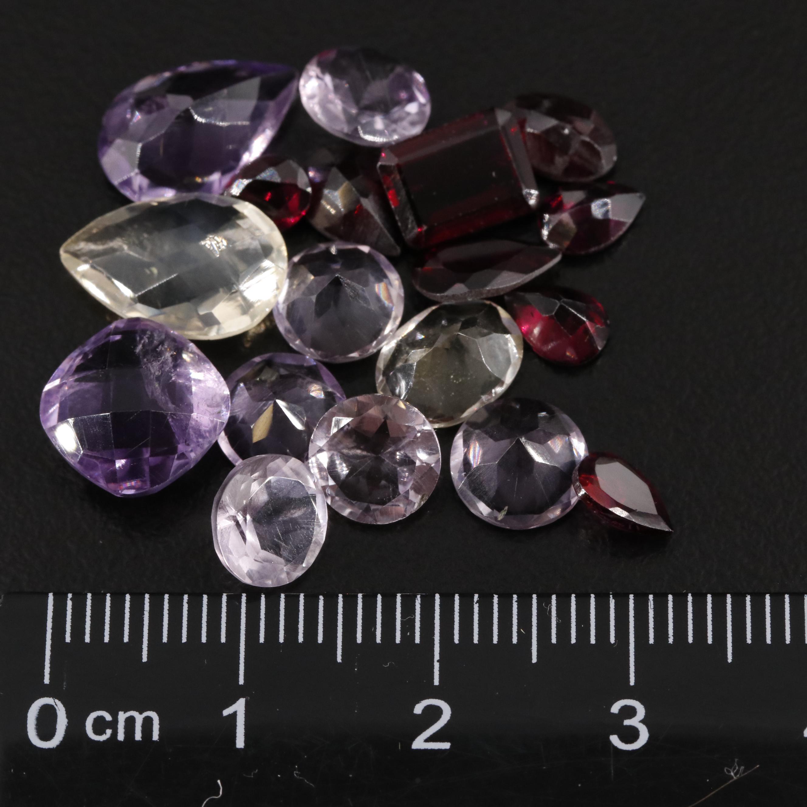 Loose 22.00 CTW Amethyst, Citrine, and Garnet Lot