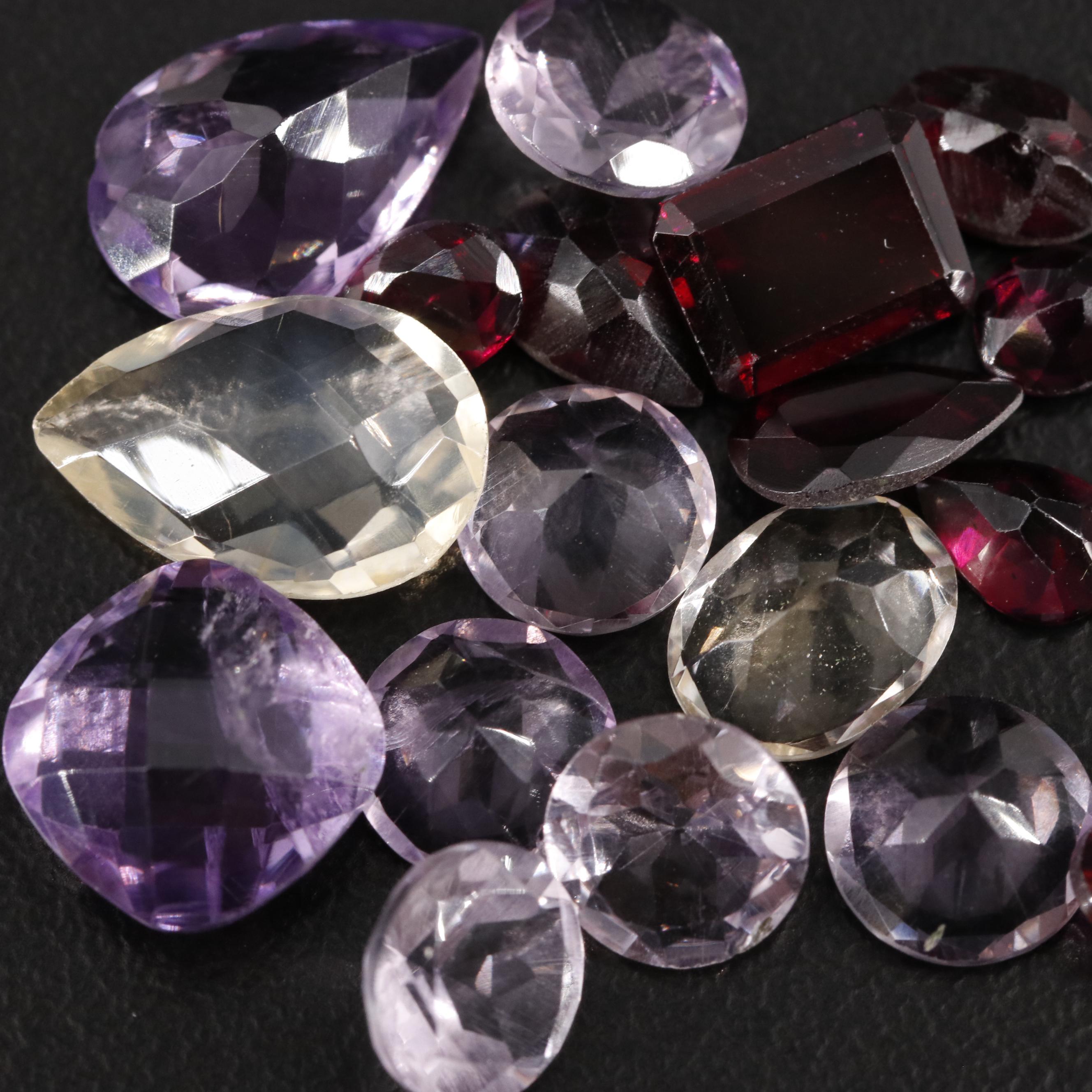 Loose 22.00 CTW Amethyst, Citrine, and Garnet Lot