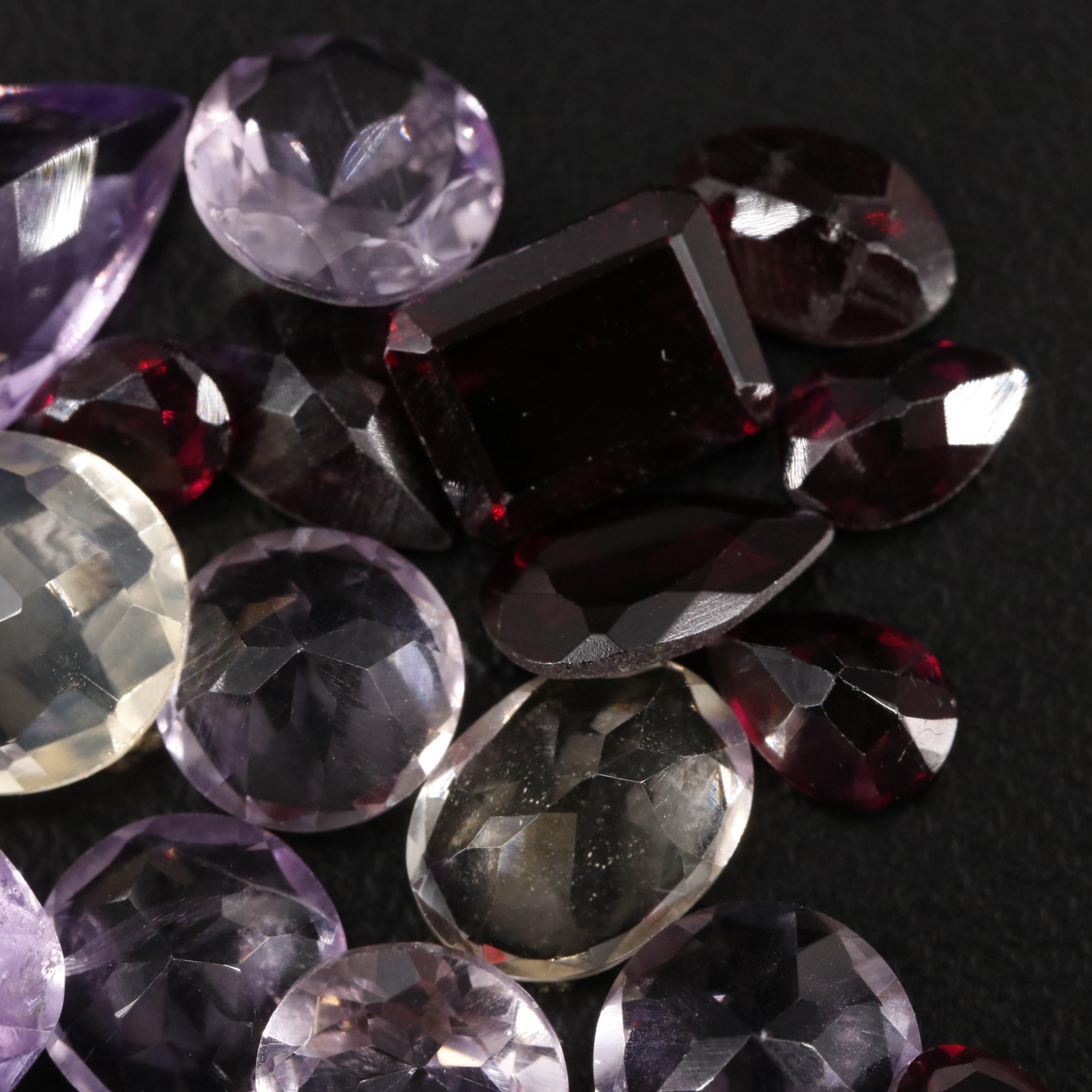 Loose 22.00 CTW Amethyst, Citrine, and Garnet Lot