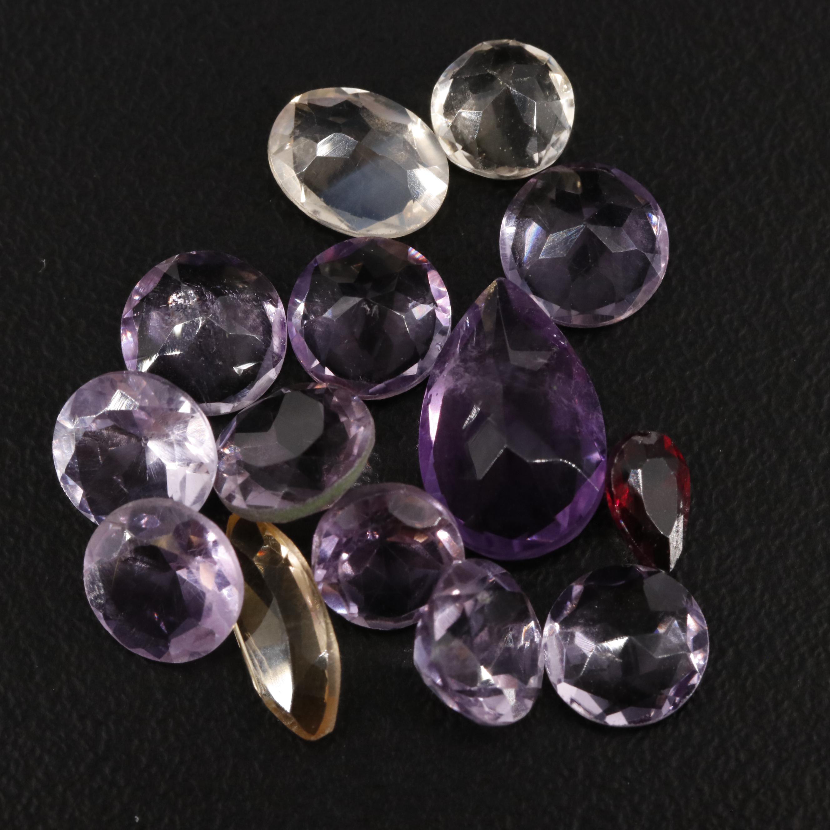 Loose 15.65 CTW Amethyst, Citrine, and Garnet Lot