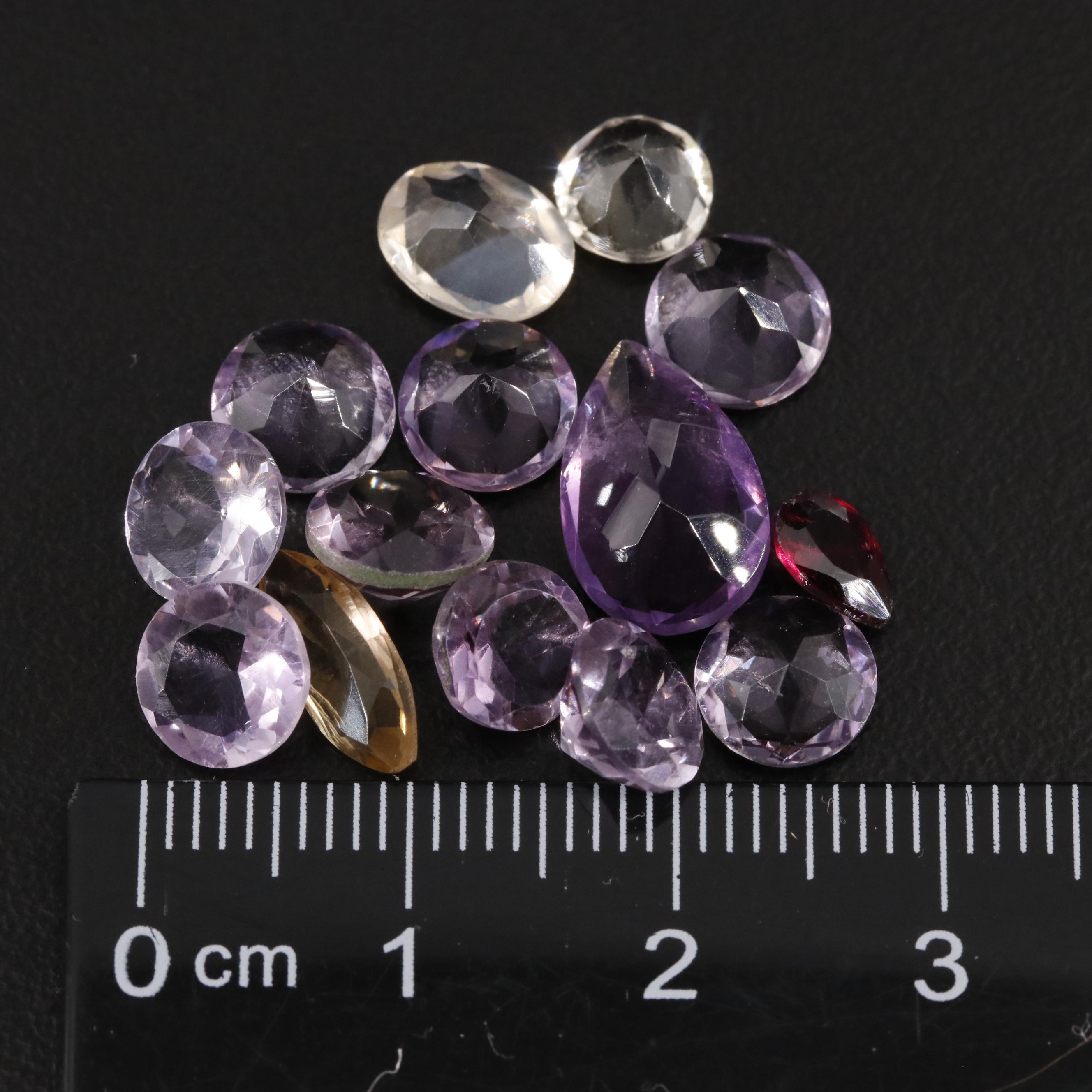 Loose 15.65 CTW Amethyst, Citrine, and Garnet Lot
