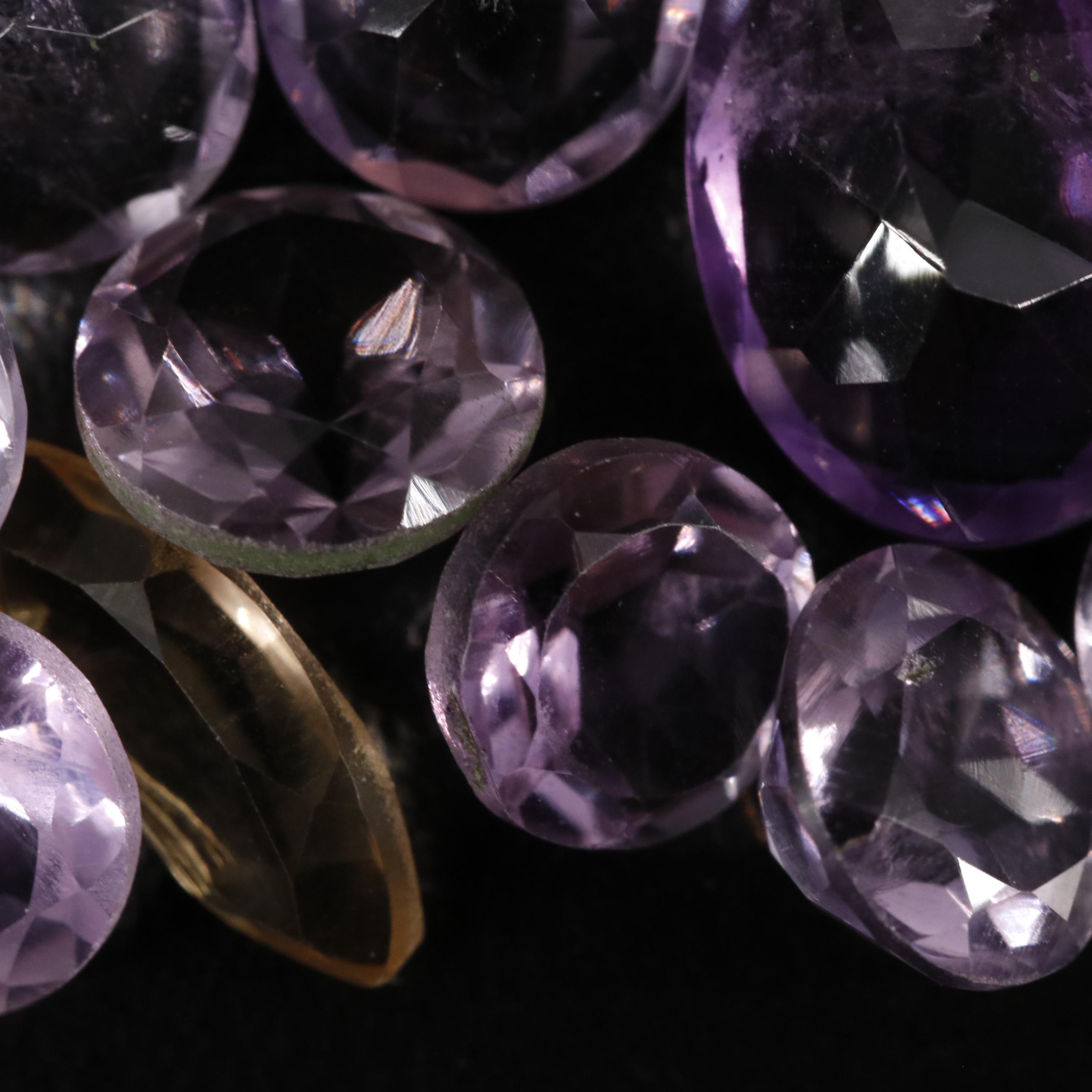 Loose 15.65 CTW Amethyst, Citrine, and Garnet Lot