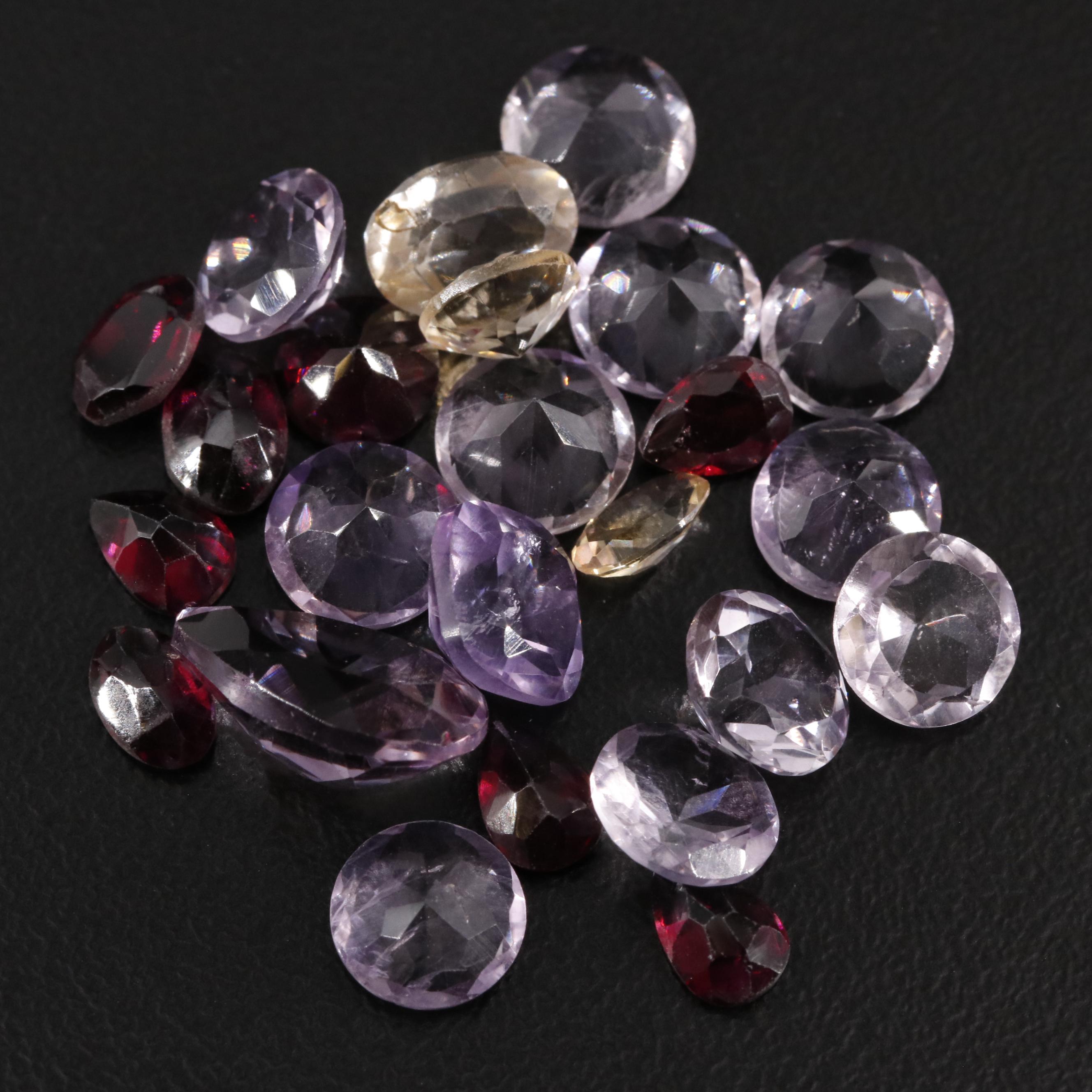 Loose 23.35 CTW Amethyst, Citrine, and Garnet Lot