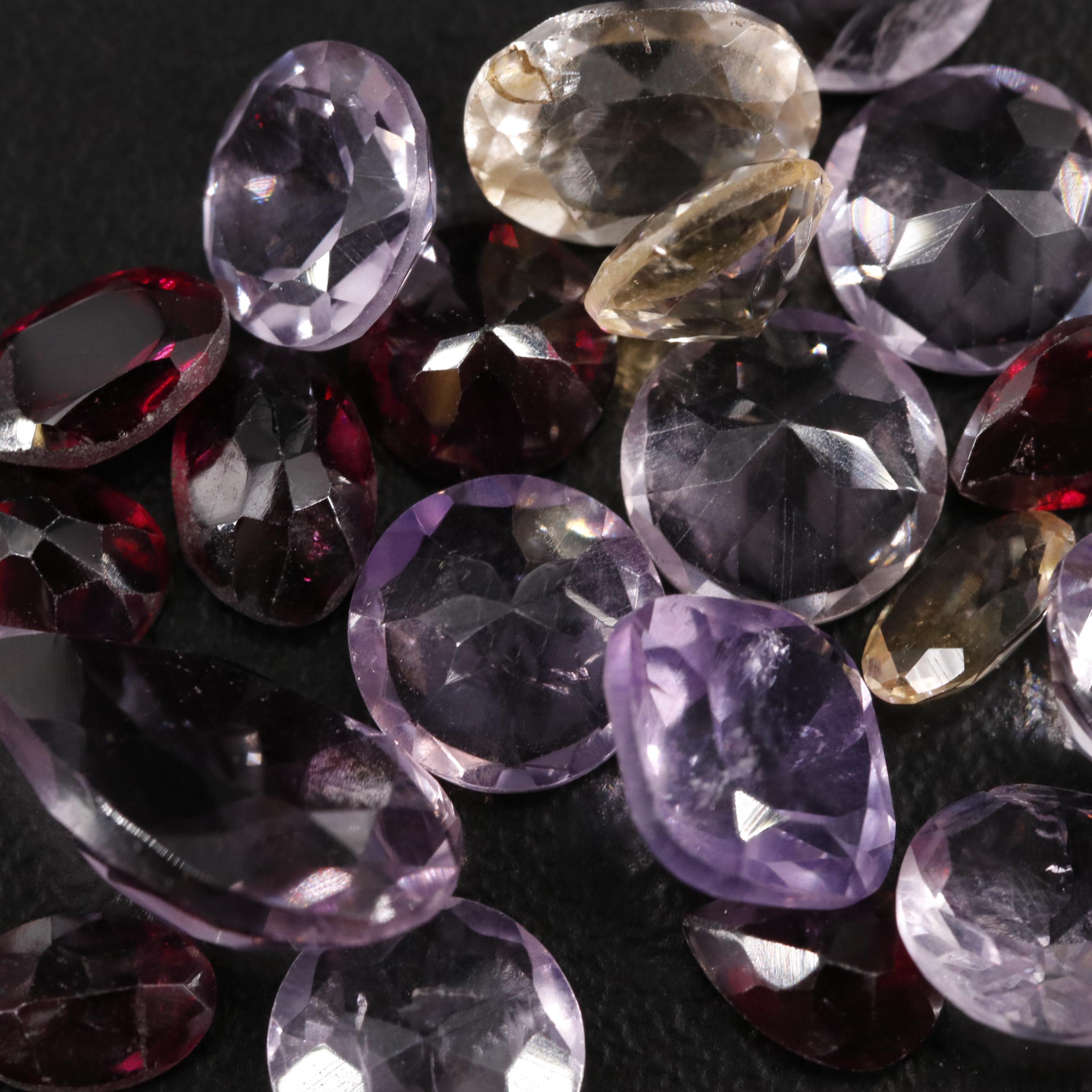 Loose 23.35 CTW Amethyst, Citrine, and Garnet Lot