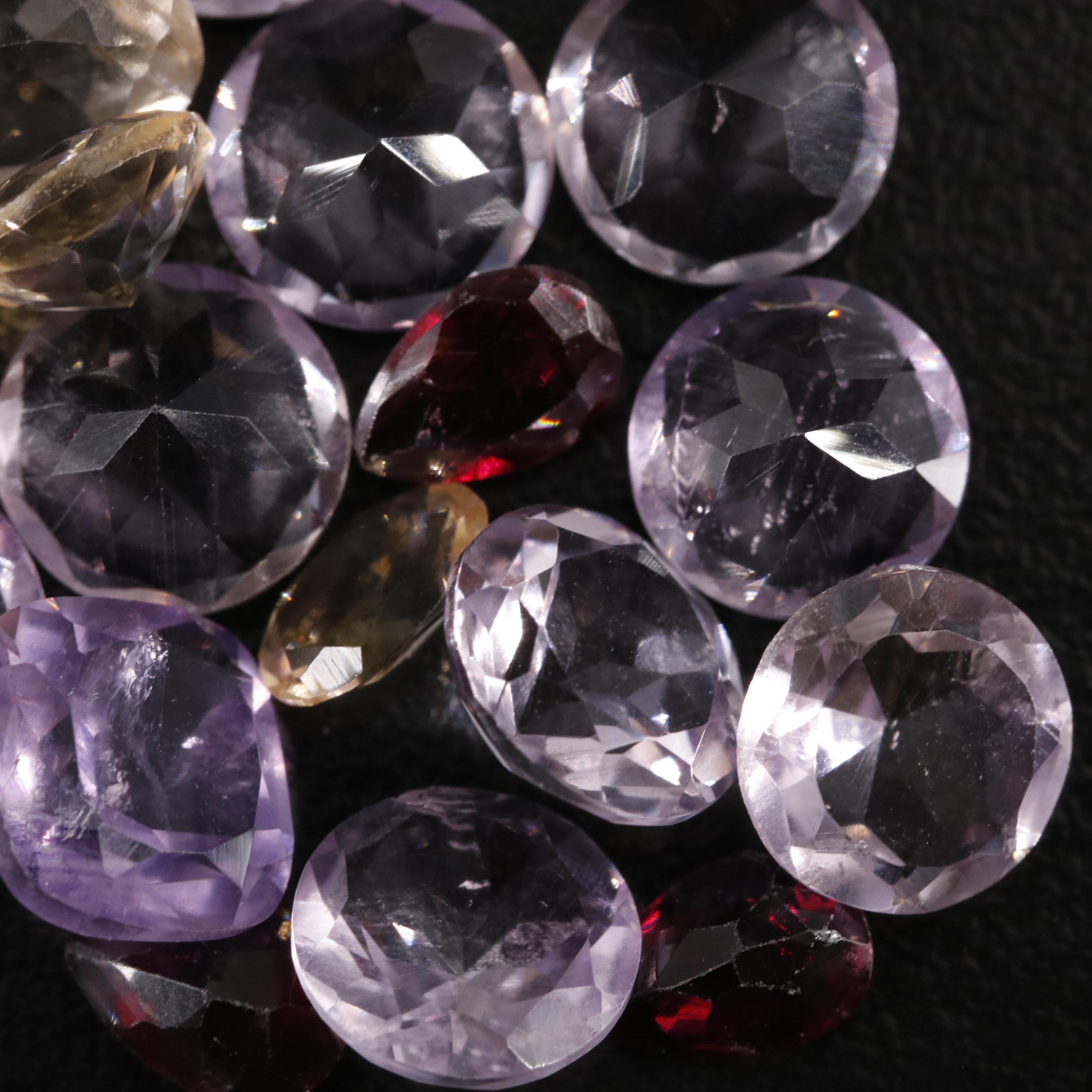 Loose 23.35 CTW Amethyst, Citrine, and Garnet Lot