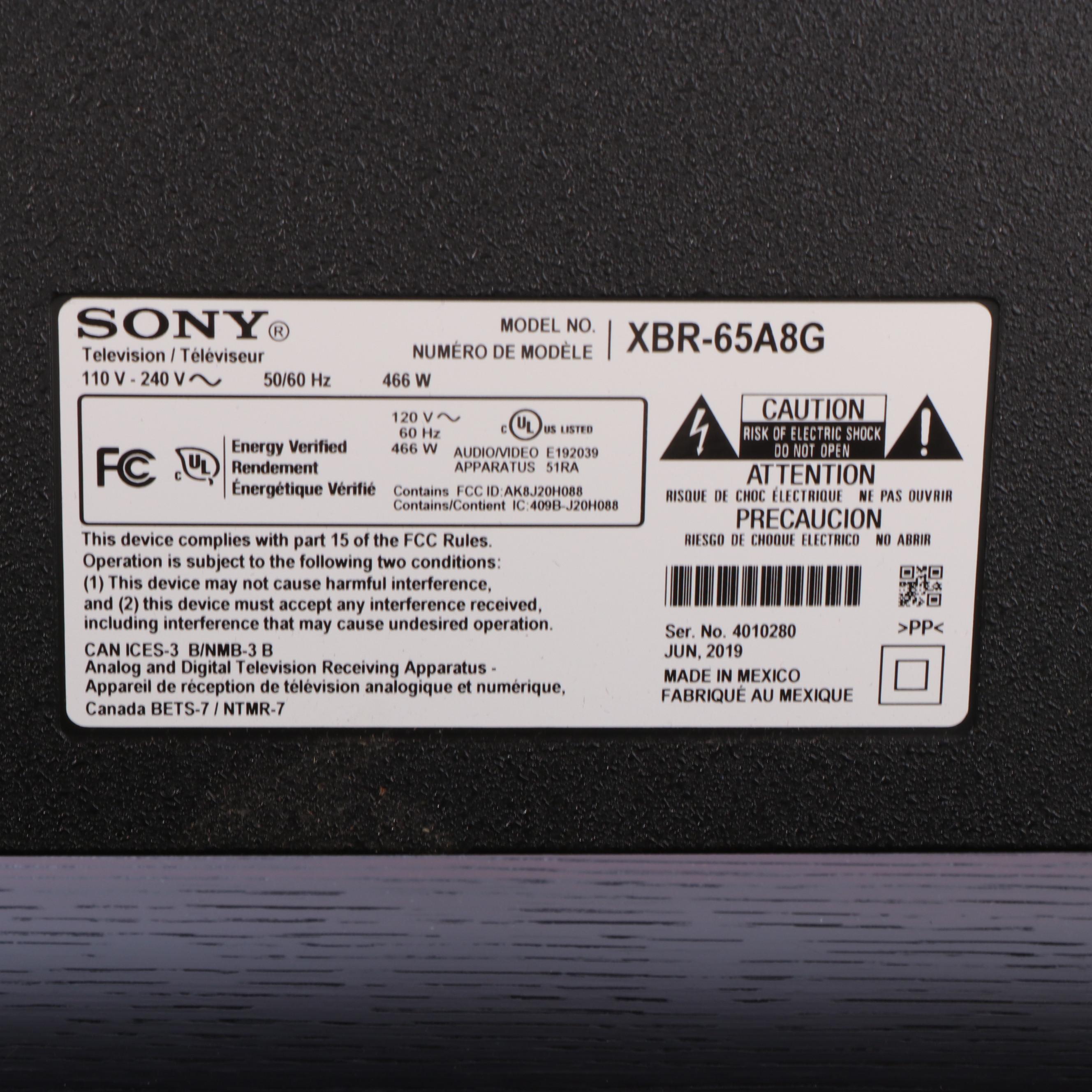 Sony XBR 65" 4K UHD LCD Television with Entertainment Stand and Blu-Ray Player