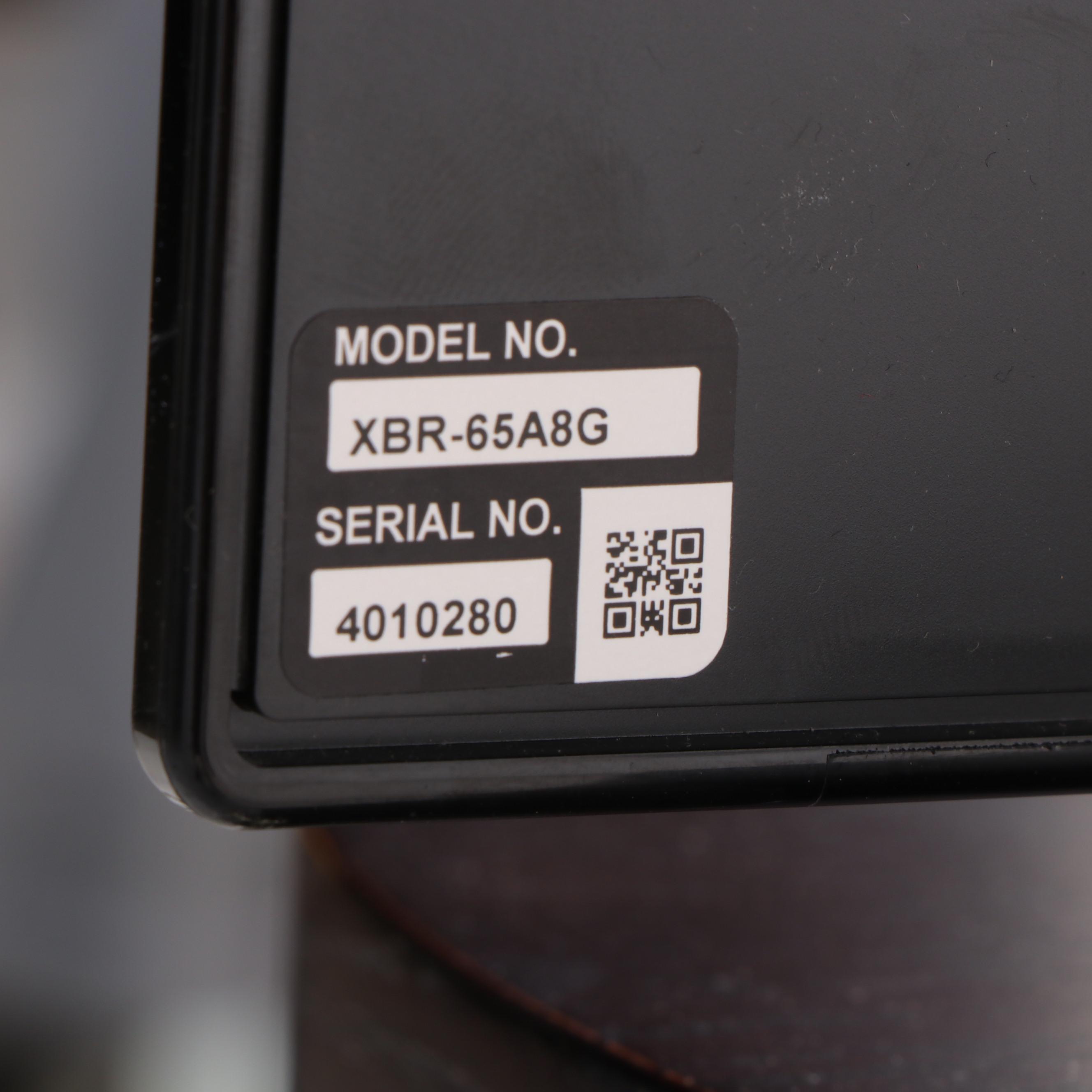 Sony XBR 65" 4K UHD LCD Television with Entertainment Stand and Blu-Ray Player