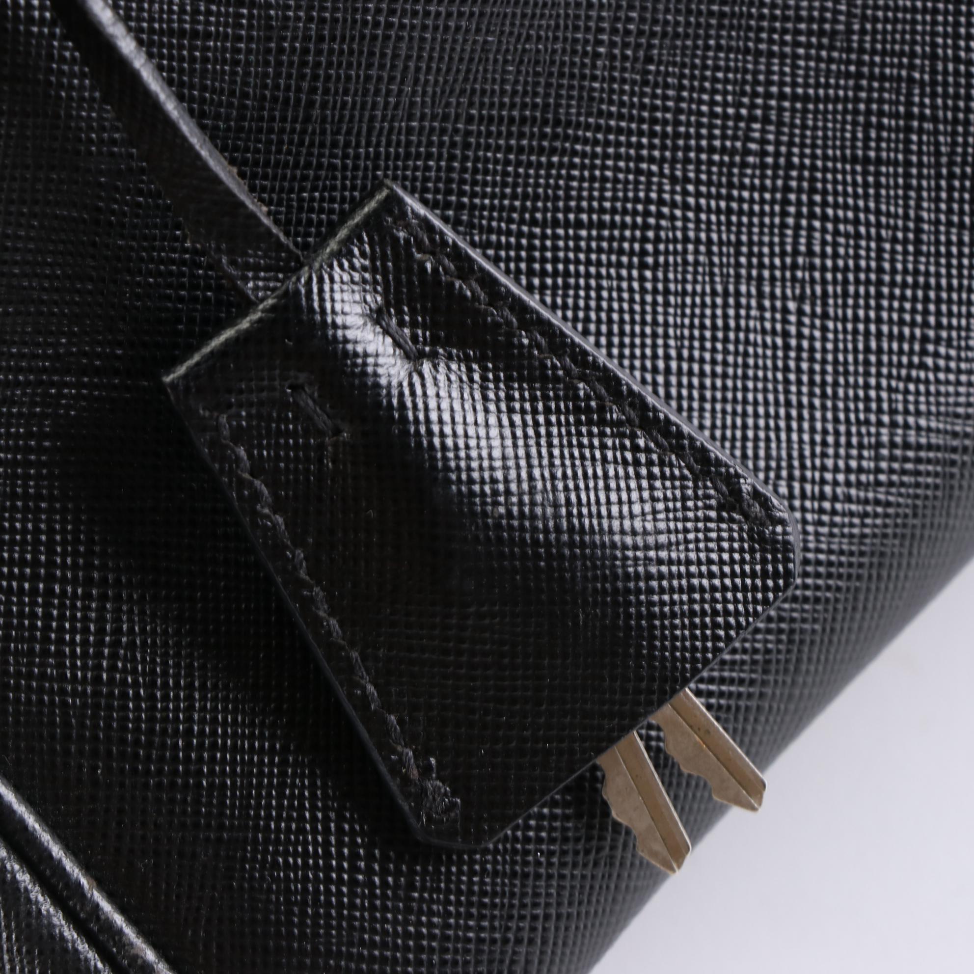 Prada Bauletto Locking Bag in Black Saffiano Leather