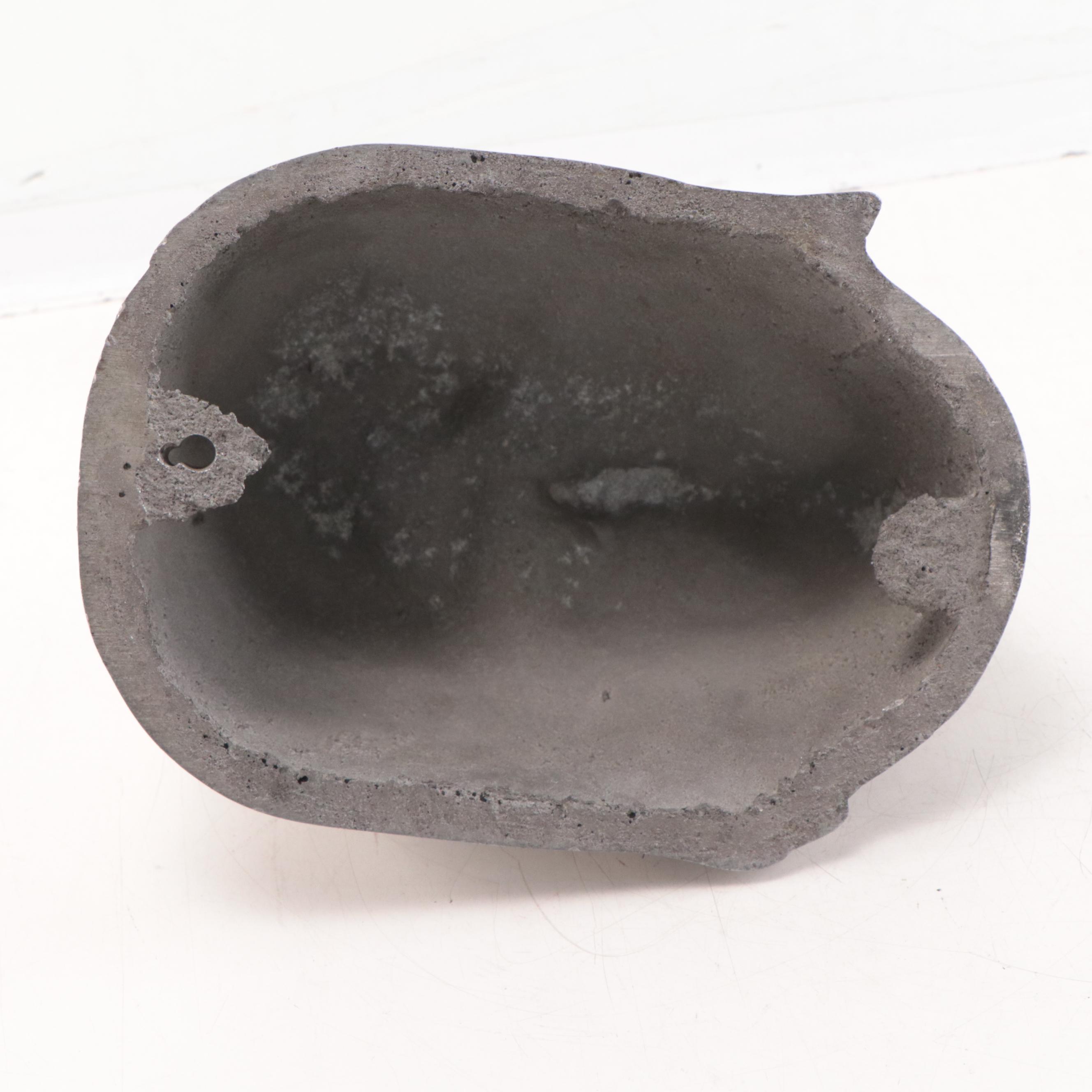 Cast Metal Portait of Old Man With Locked Mouth