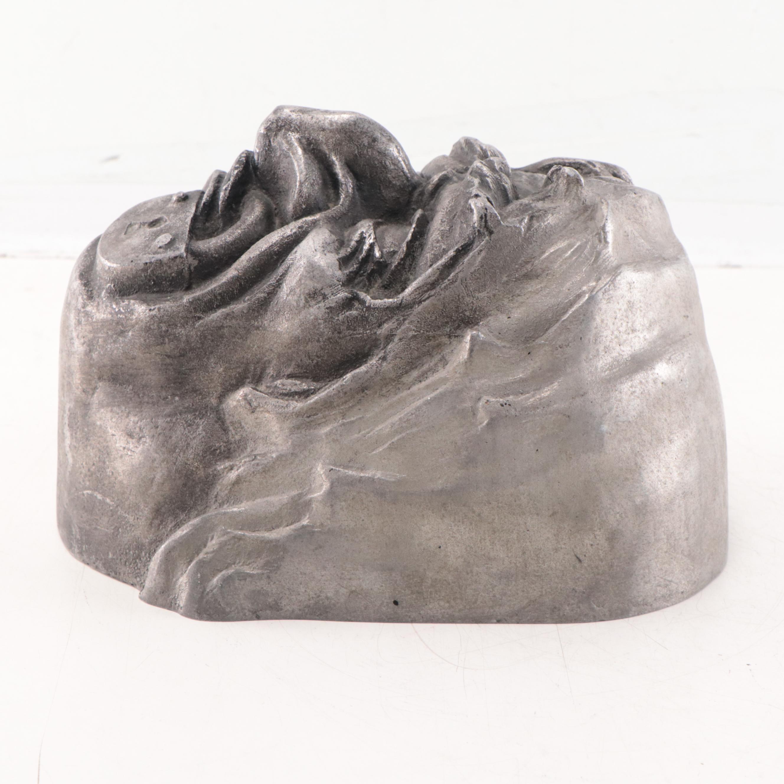 Cast Metal Portait of Old Man With Locked Mouth