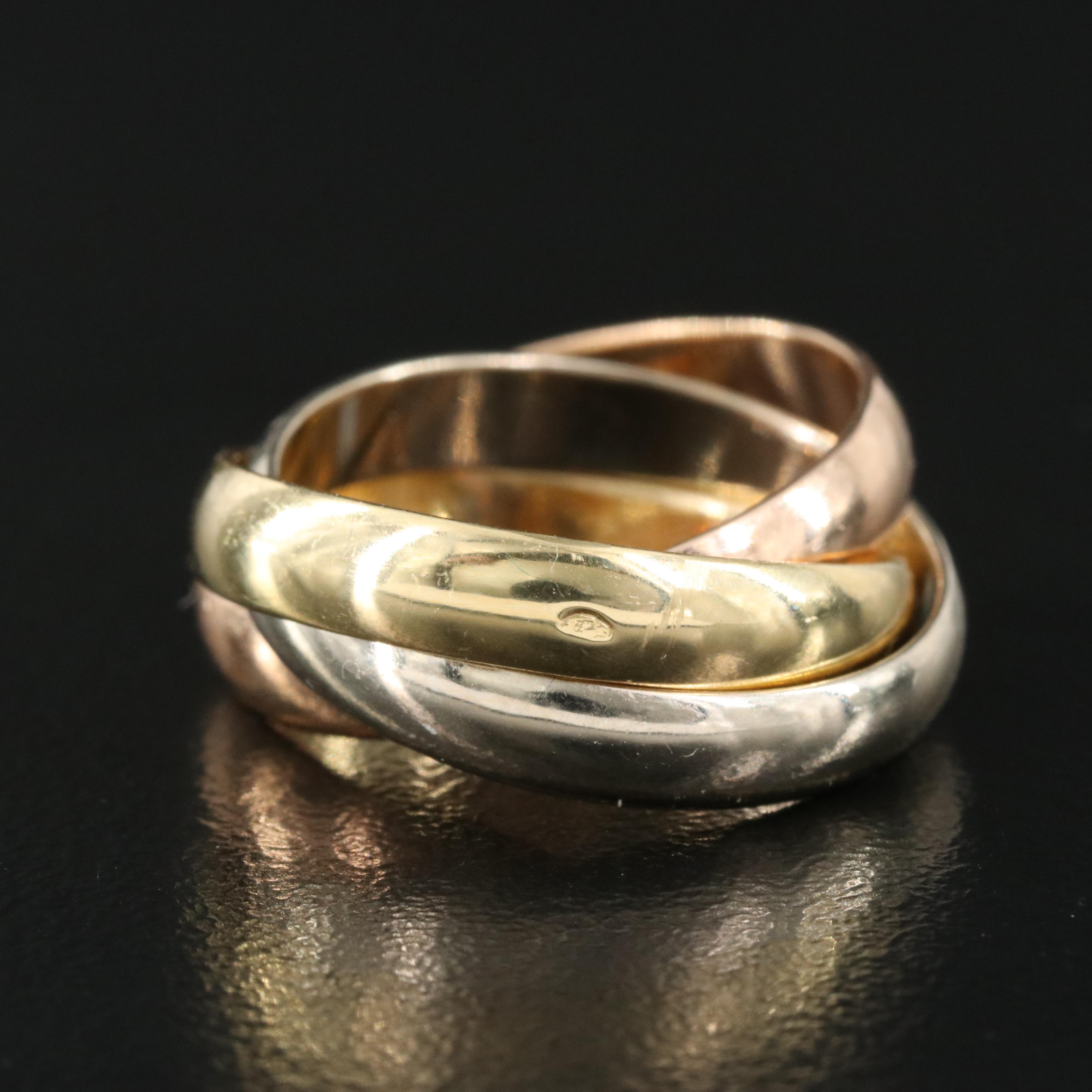 Les Must de Cartier "Trinity" 18K Tri-Color Gold Rolling Band