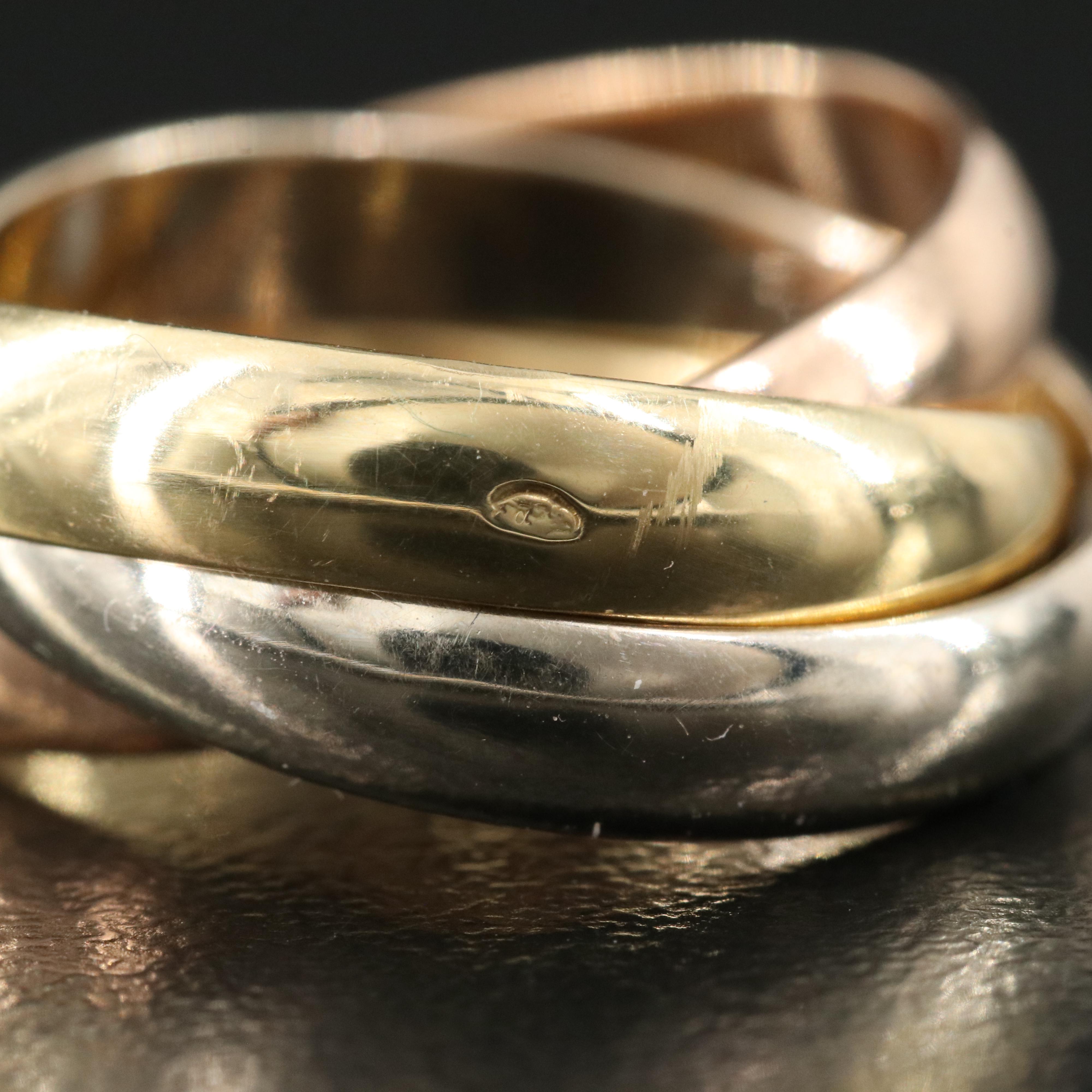 Les Must de Cartier "Trinity" 18K Tri-Color Gold Rolling Band