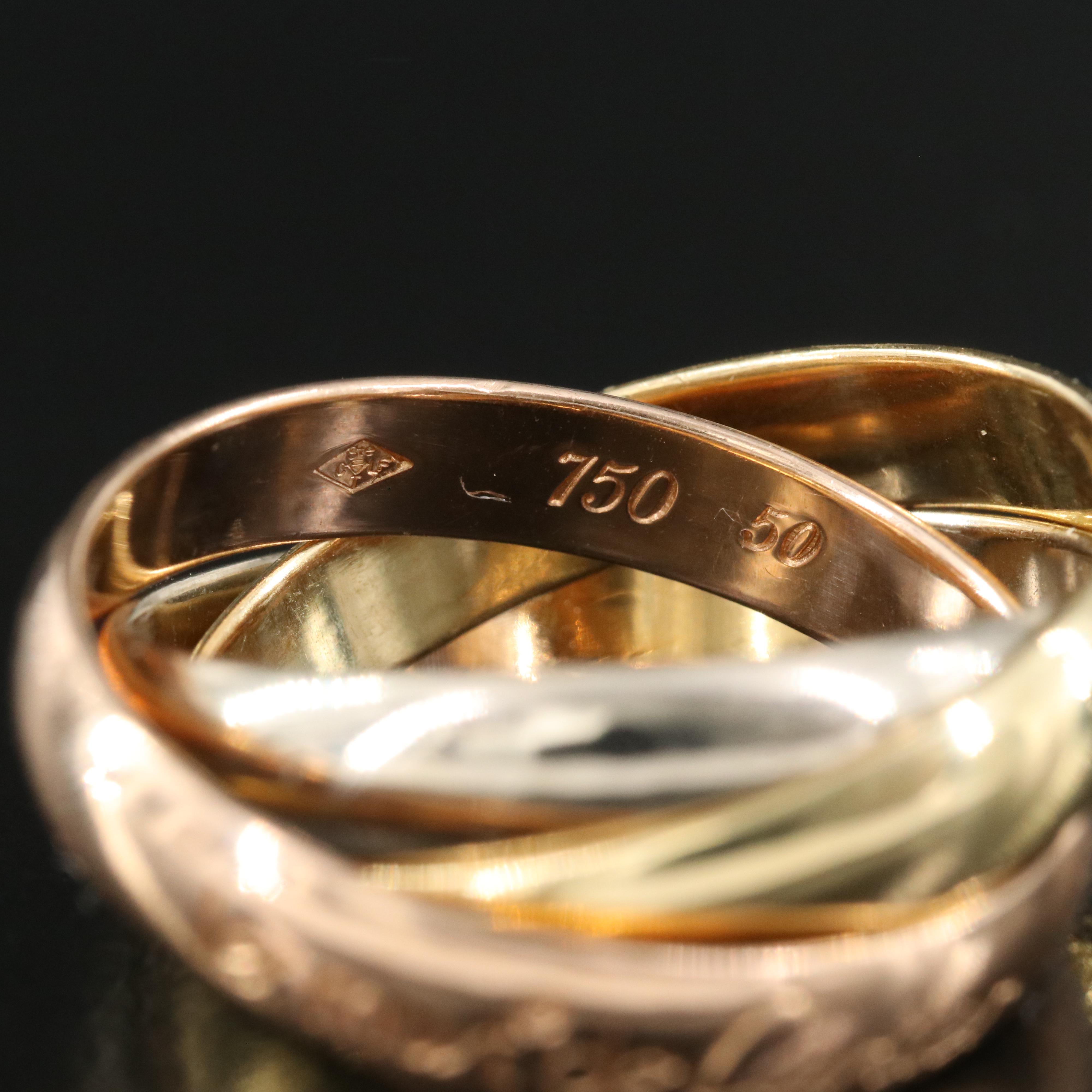 Les Must de Cartier "Trinity" 18K Tri-Color Gold Rolling Band