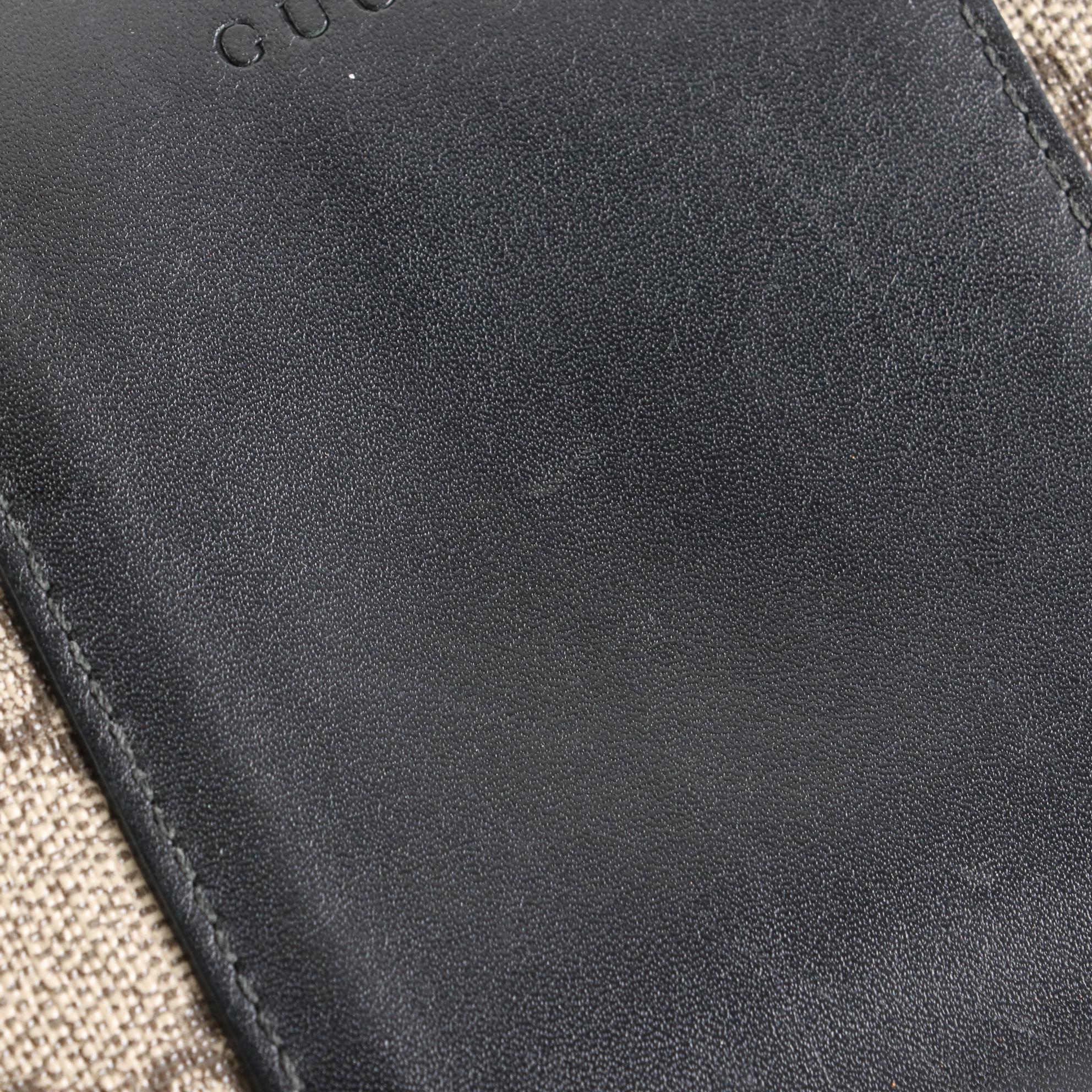 Gucci Zip-Around Wallet in GG Supreme Canvas and Black Leather