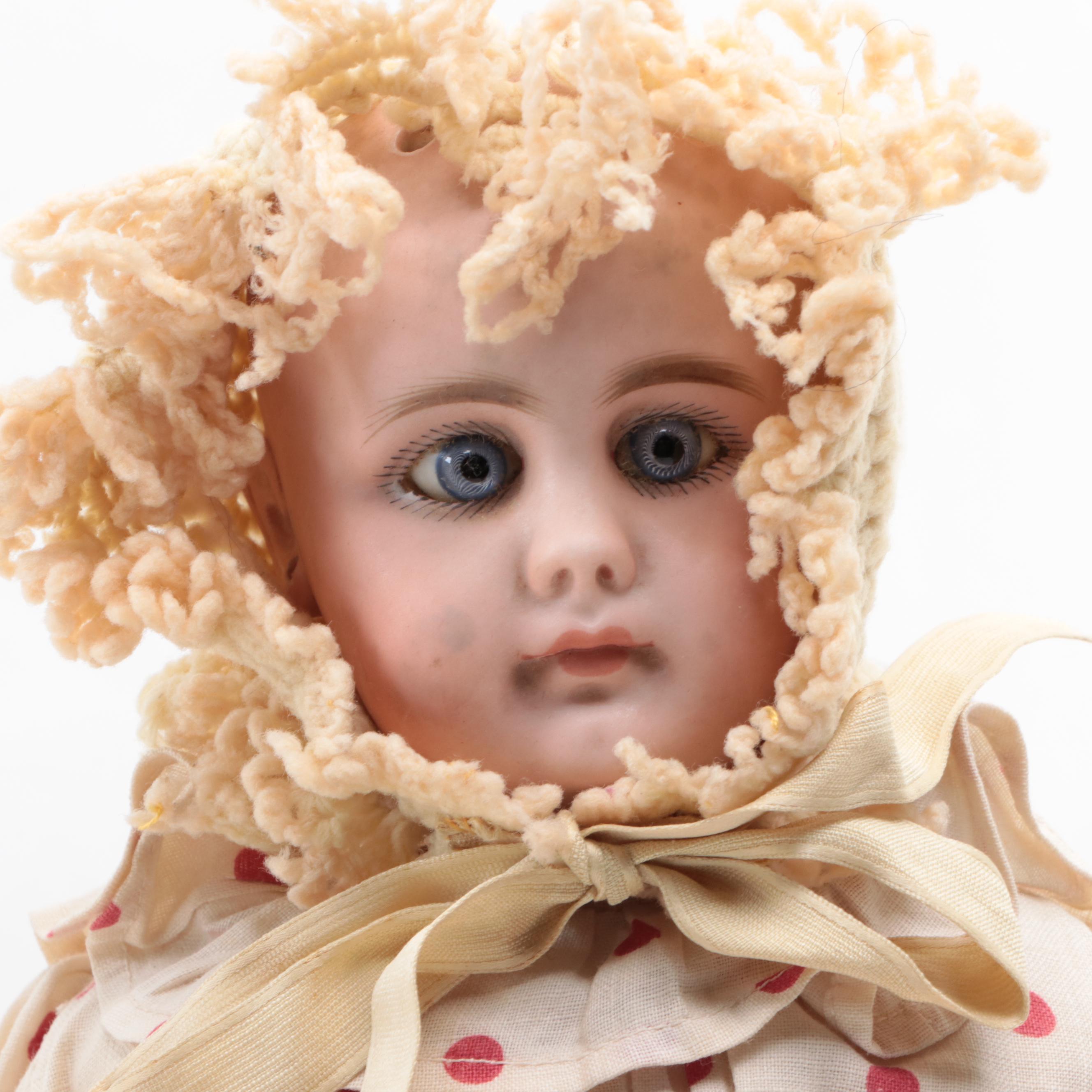 Antique Bisque Doll with Glass Eyes in Polka Dot Dress