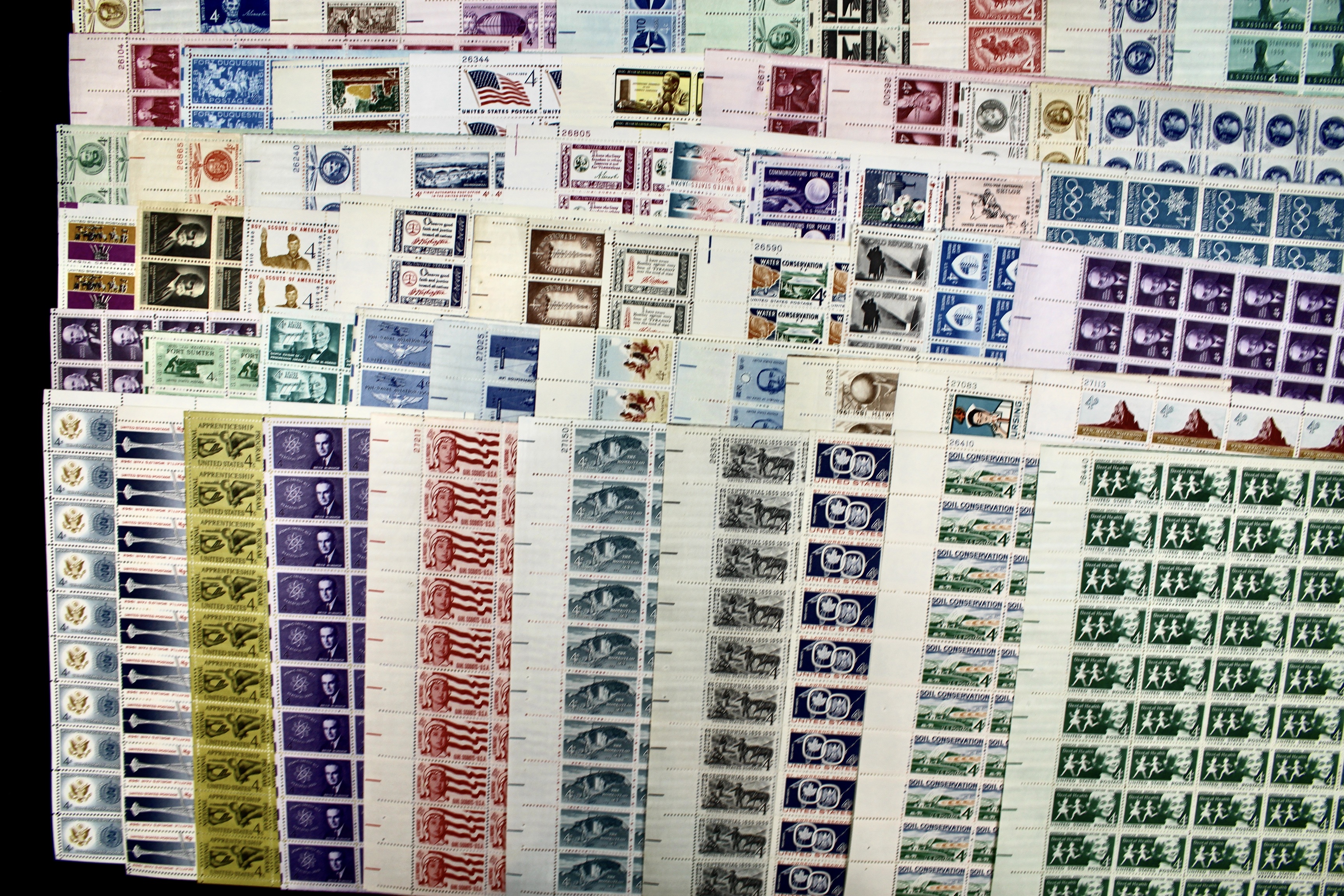 Fifty-Nine Different 4-Cent U.S. Postage Stamp Sheets, 1950s to 1960s