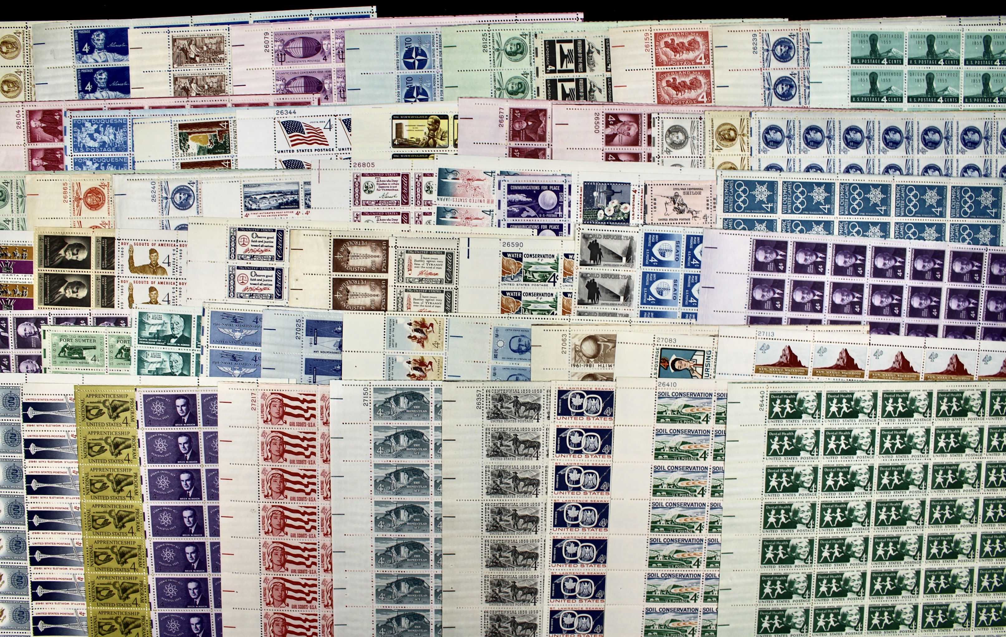 Fifty-Nine Different 4-Cent U.S. Postage Stamp Sheets, 1950s to 1960s