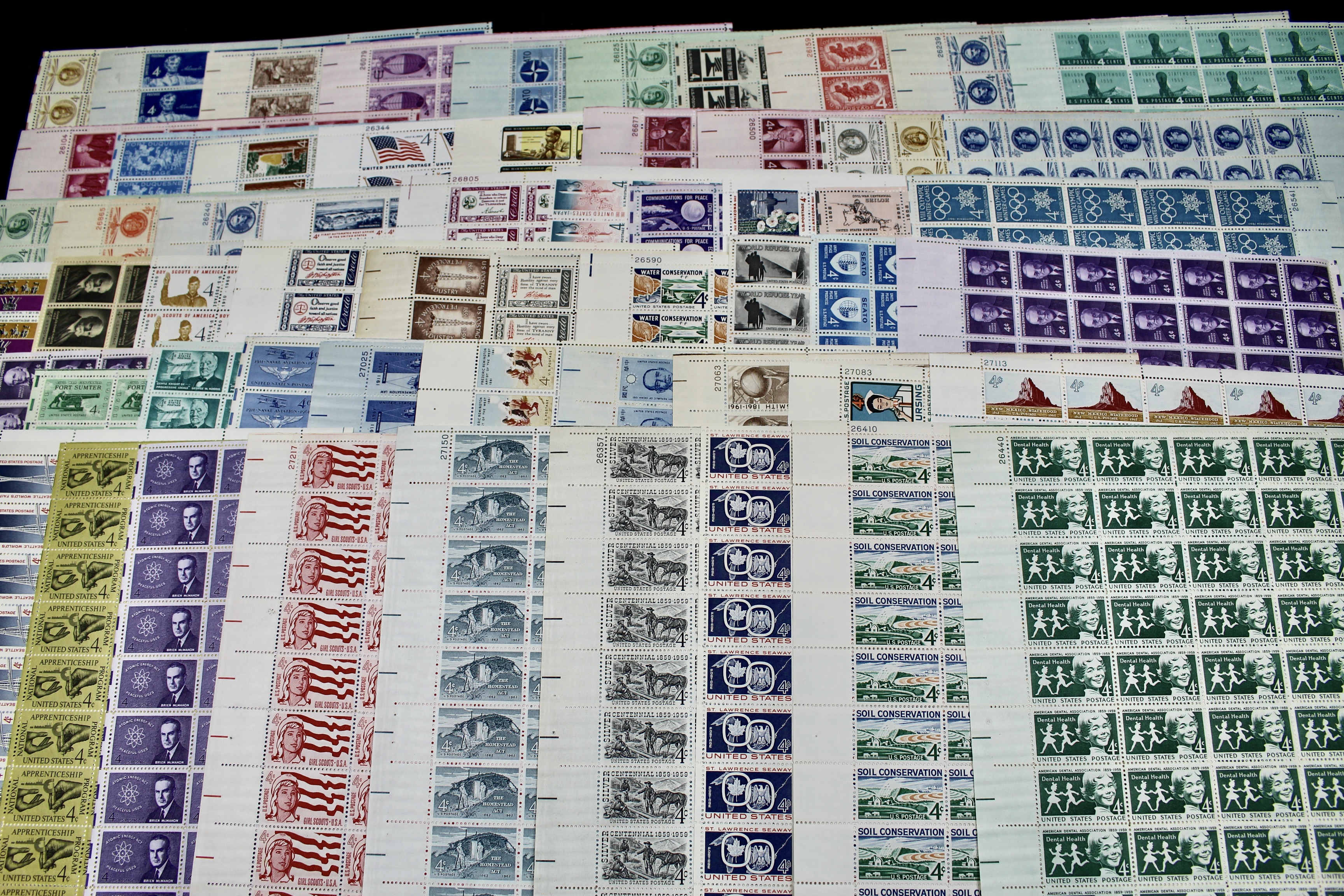 Fifty-Nine Different 4-Cent U.S. Postage Stamp Sheets, 1950s to 1960s