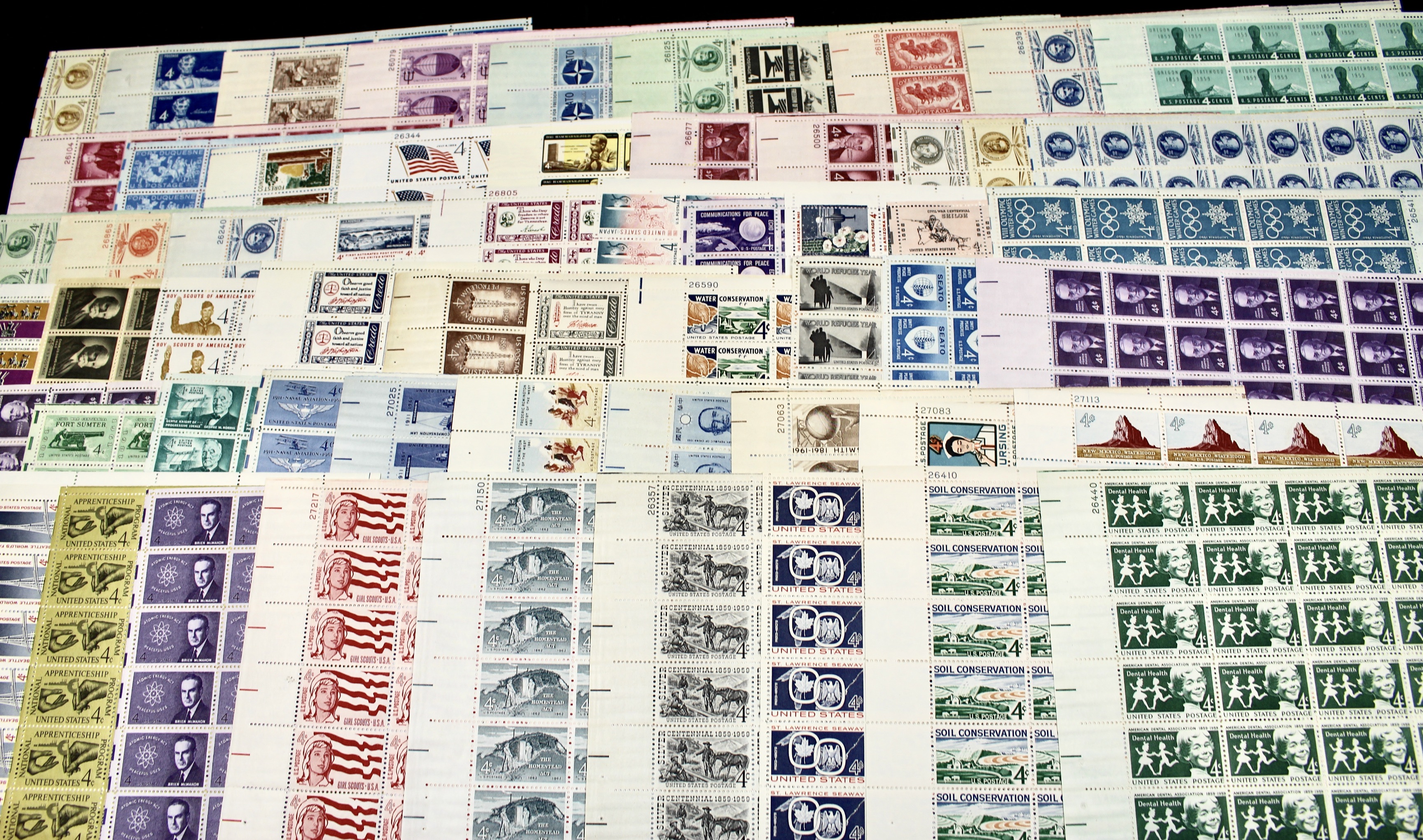 Fifty-Nine Different 4-Cent U.S. Postage Stamp Sheets, 1950s to 1960s