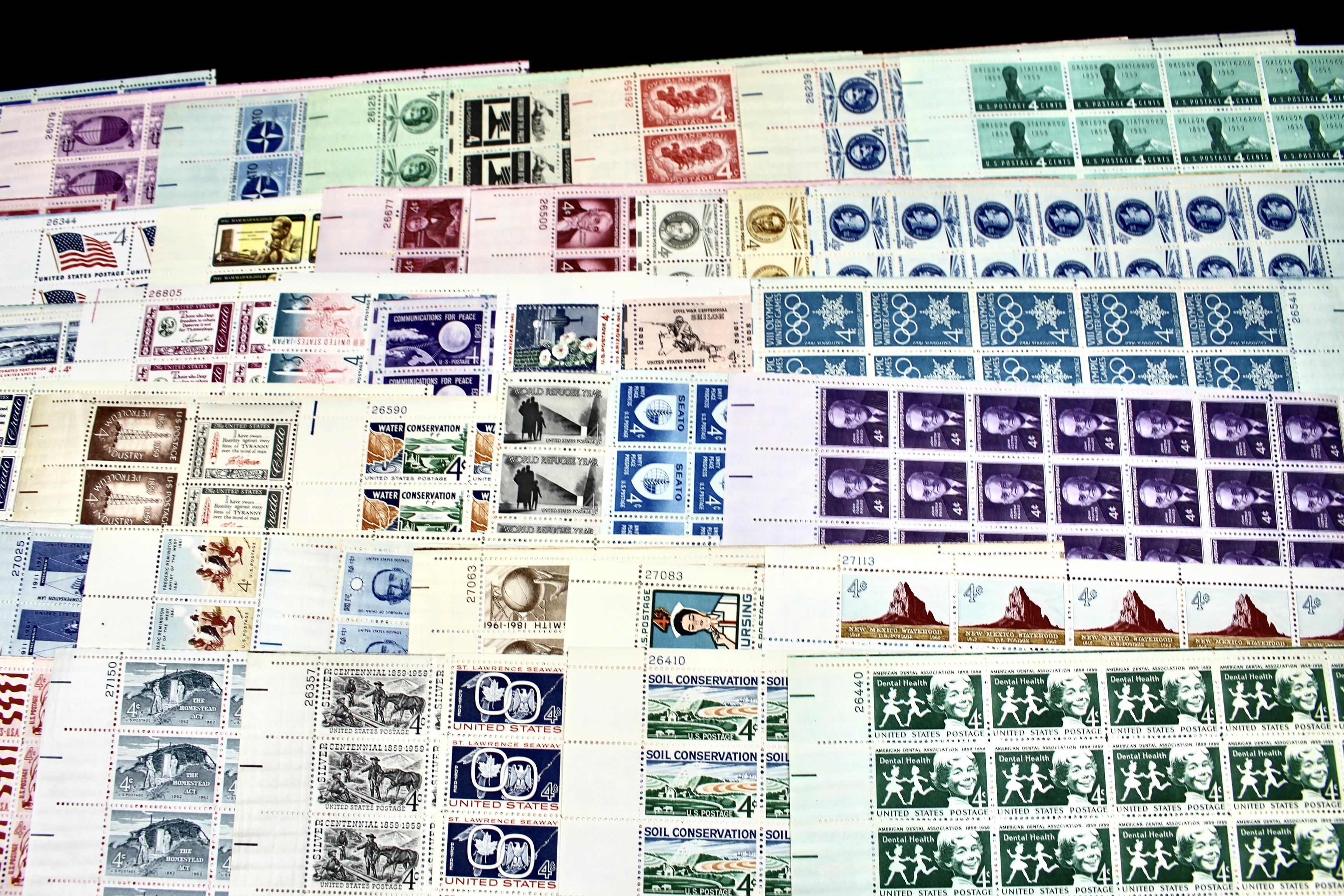 Fifty-Nine Different 4-Cent U.S. Postage Stamp Sheets, 1950s to 1960s