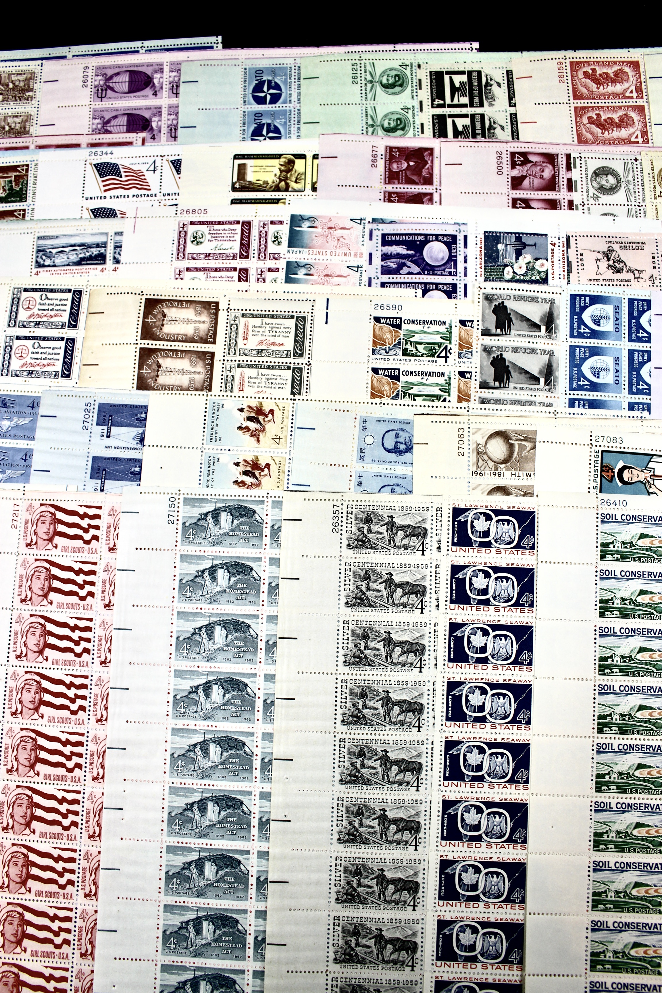 Fifty-Nine Different 4-Cent U.S. Postage Stamp Sheets, 1950s to 1960s
