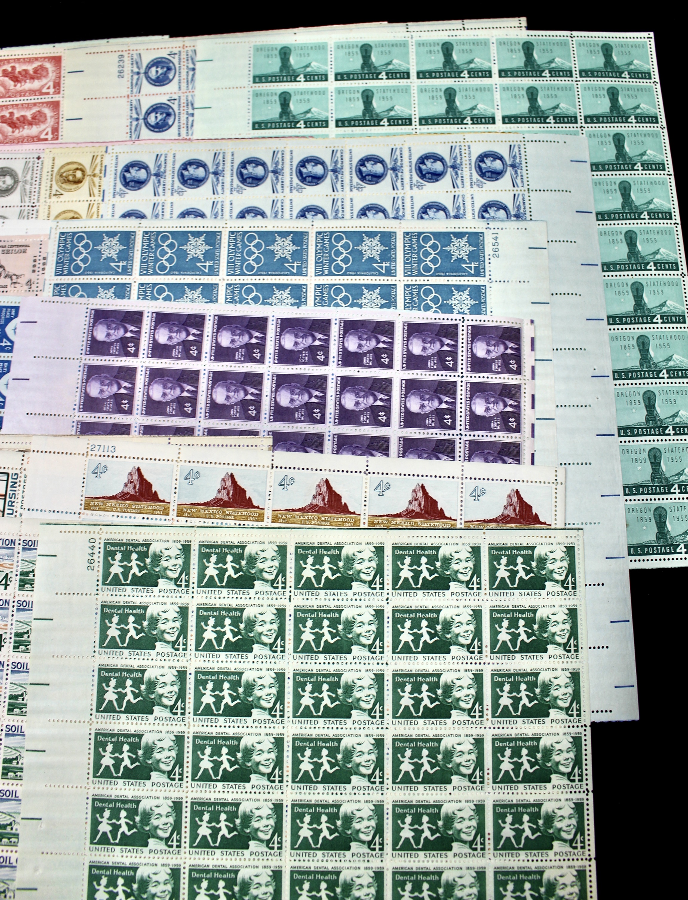 Fifty-Nine Different 4-Cent U.S. Postage Stamp Sheets, 1950s to 1960s