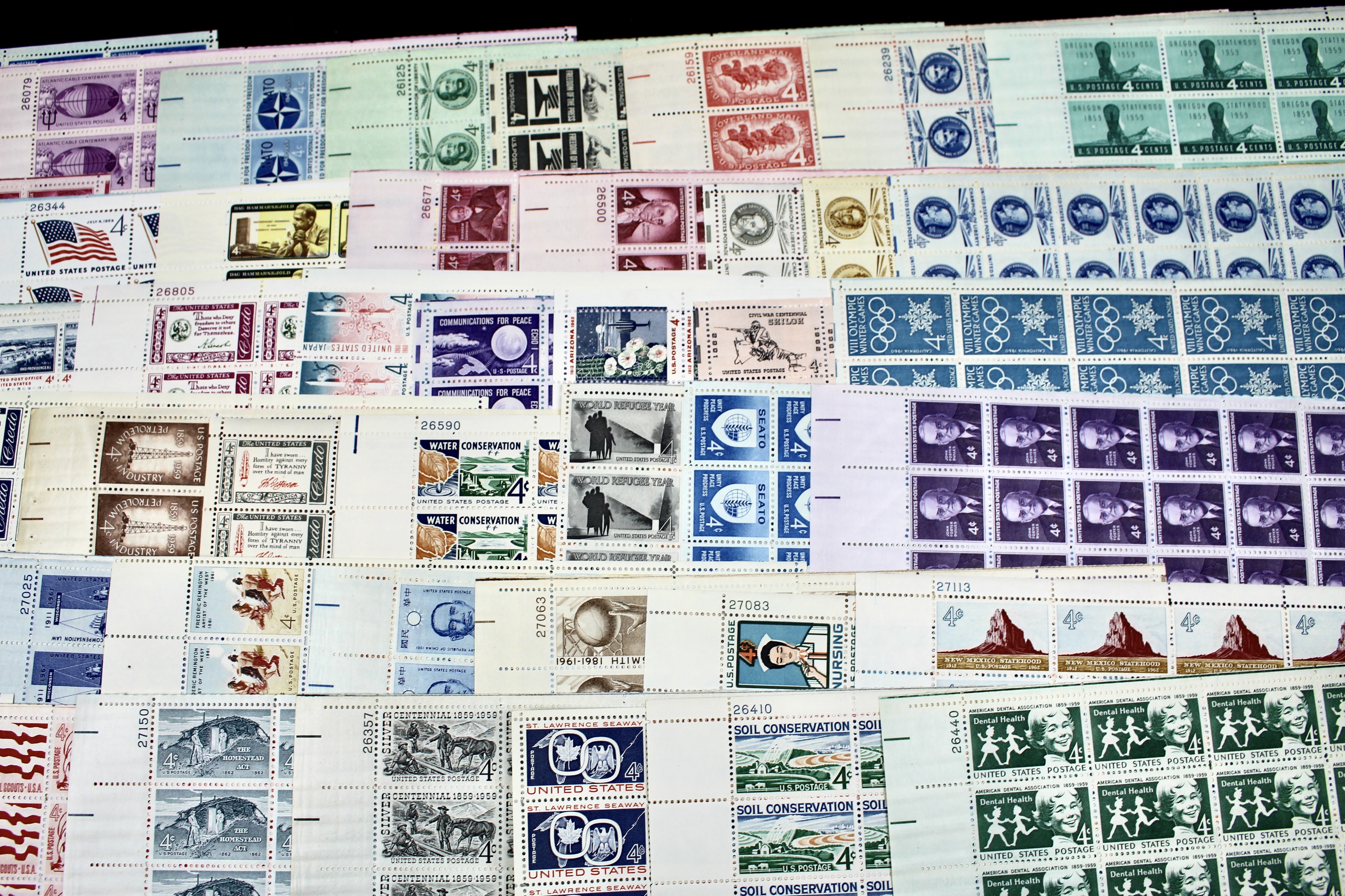 Fifty-Nine Different 4-Cent U.S. Postage Stamp Sheets, 1950s to 1960s