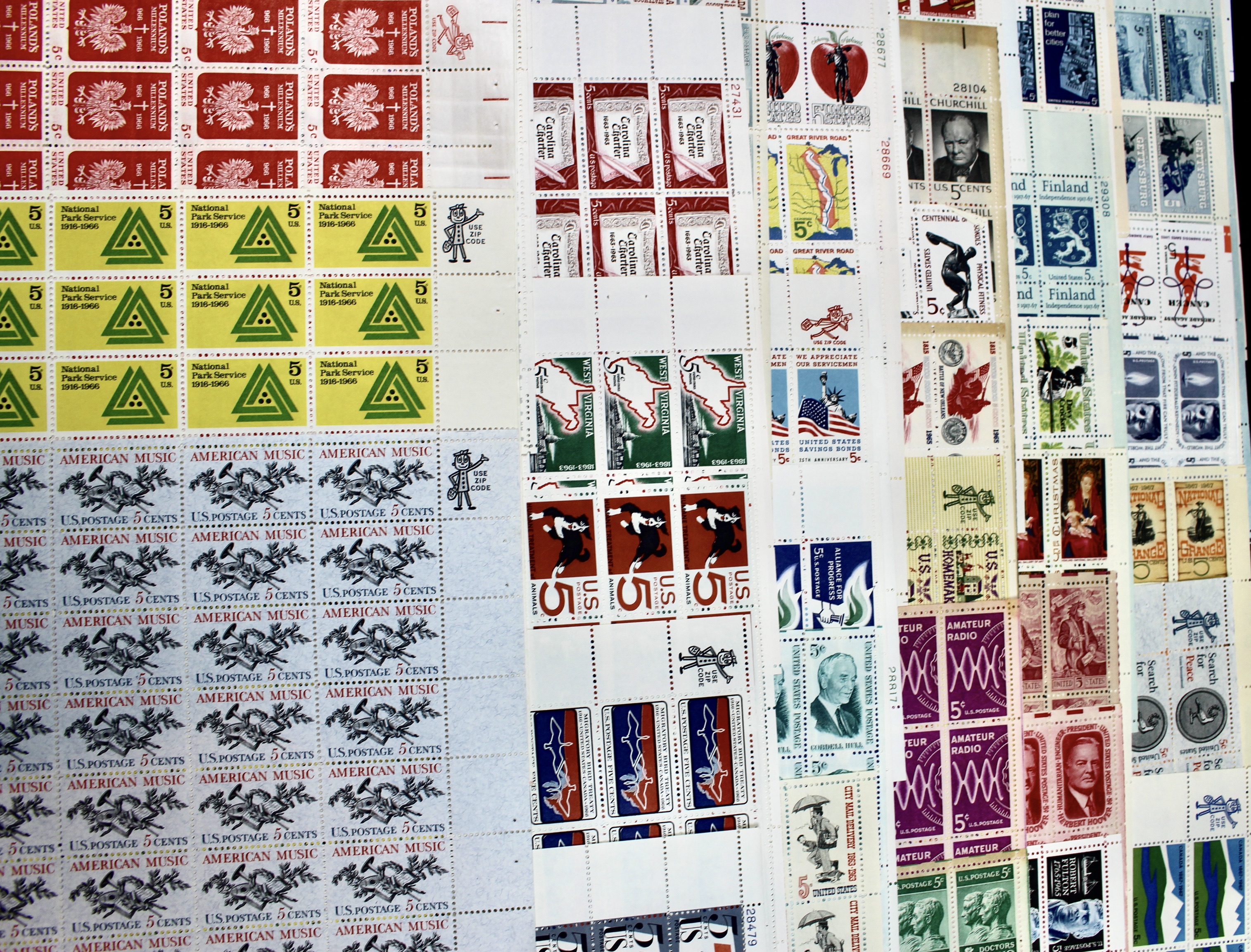 Fifty-Six Different 5-Cent U.S. Postage Stamp Sheets, 1960s