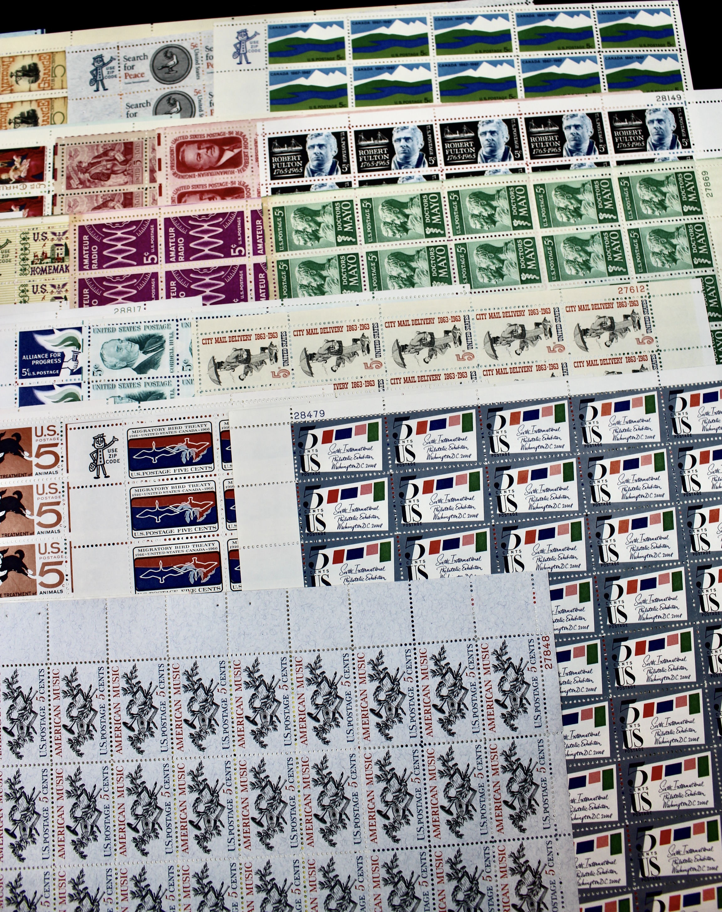 Fifty-Six Different 5-Cent U.S. Postage Stamp Sheets, 1960s