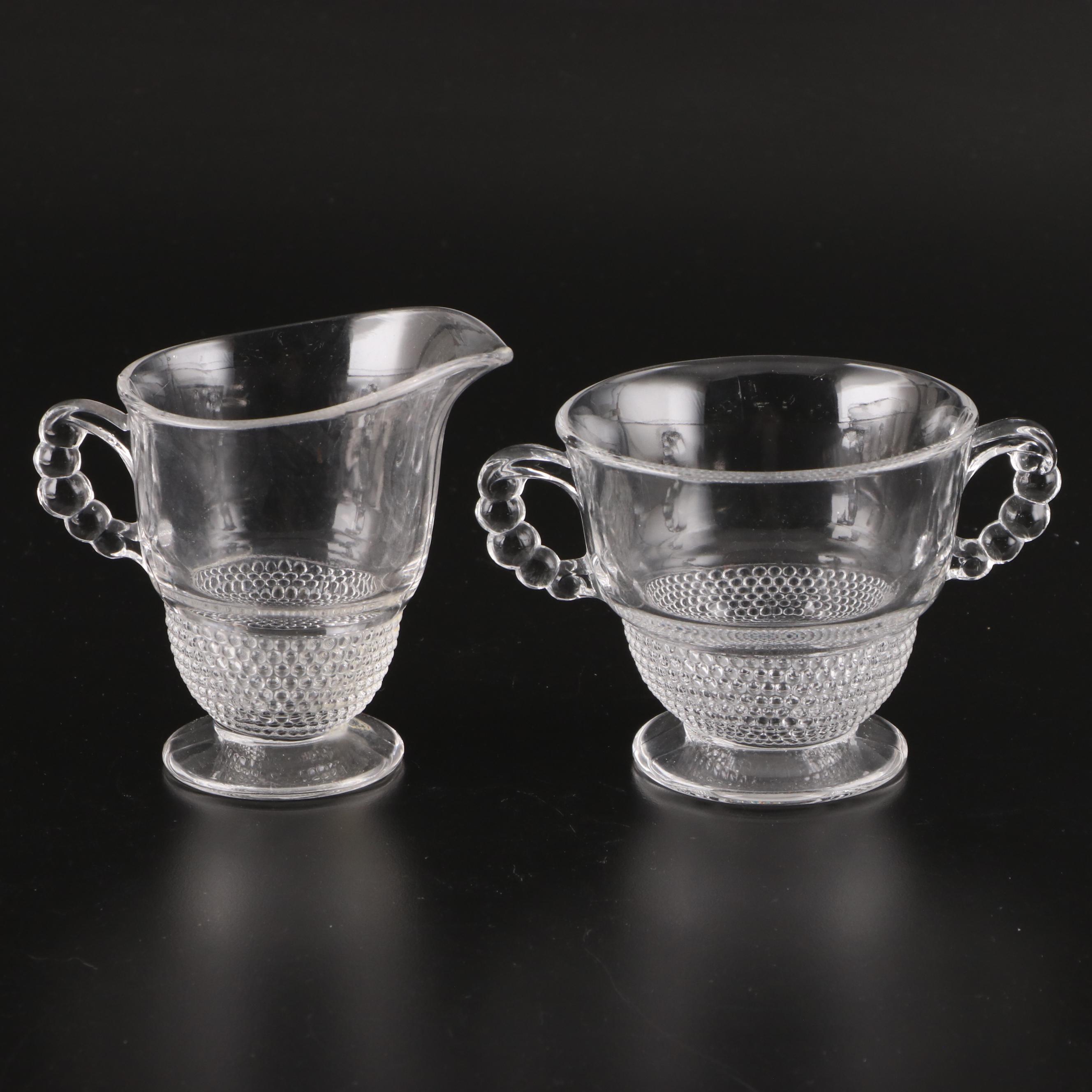 Duncan & Miller "Teardrop Clear" Glass Dinnerware with Other Silver Plate Trays