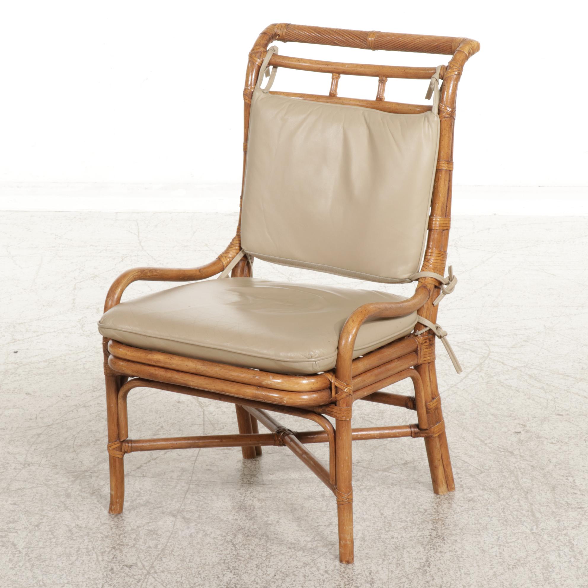 Rattan and Glass Top Dining Table and Four Chairs