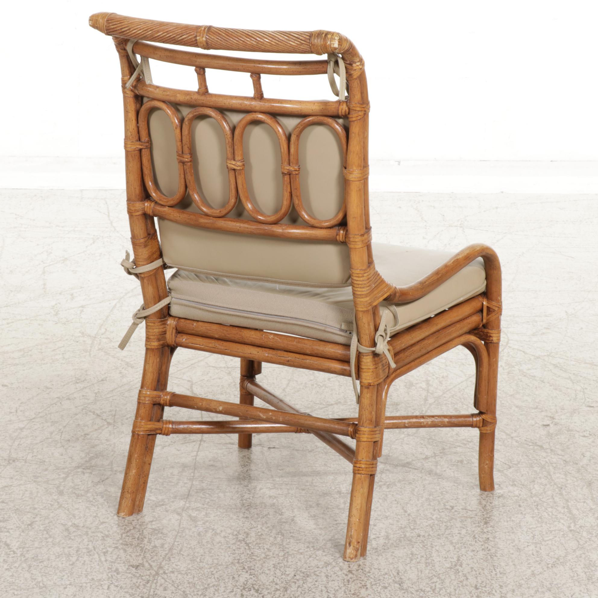 Rattan and Glass Top Dining Table and Four Chairs