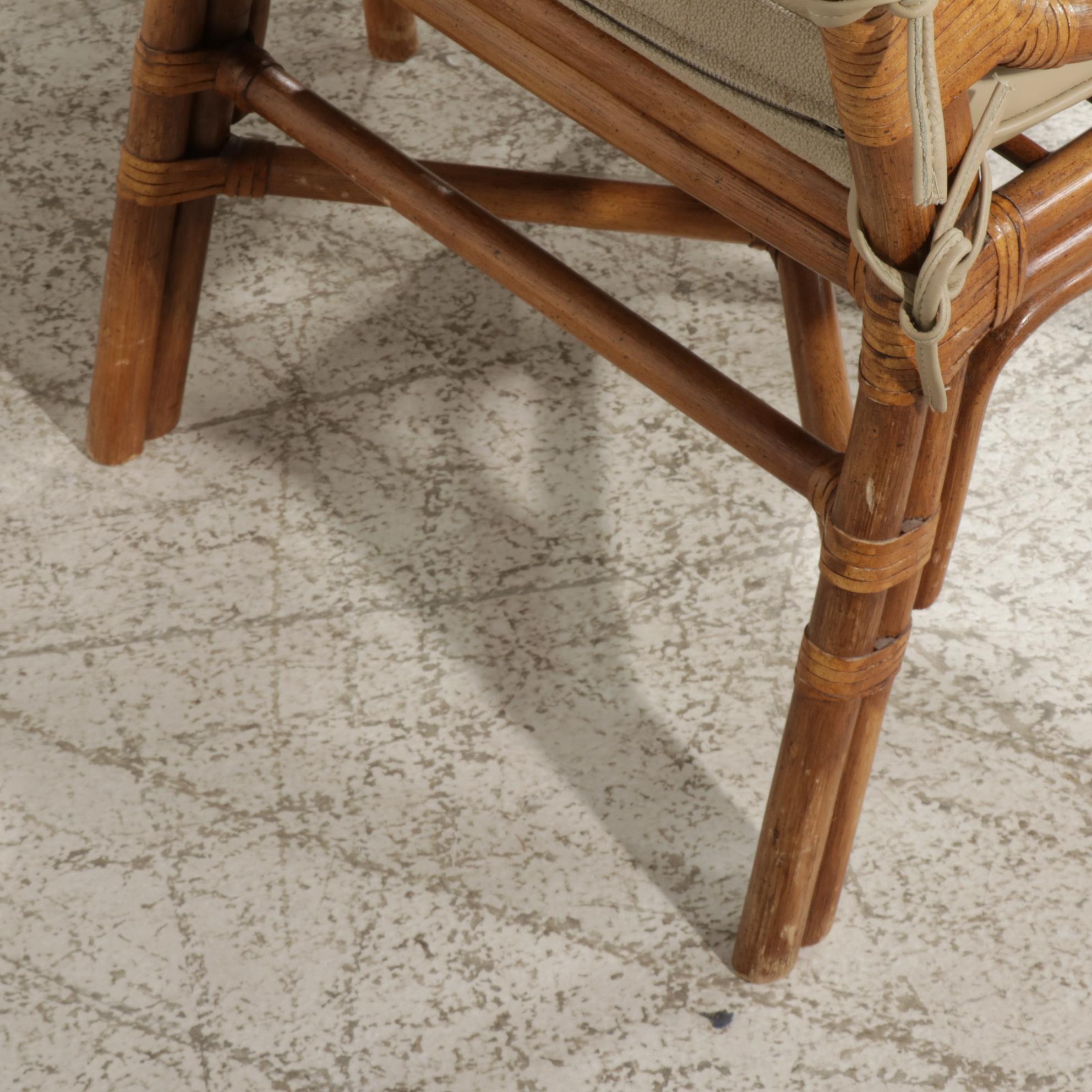 Rattan and Glass Top Dining Table and Four Chairs