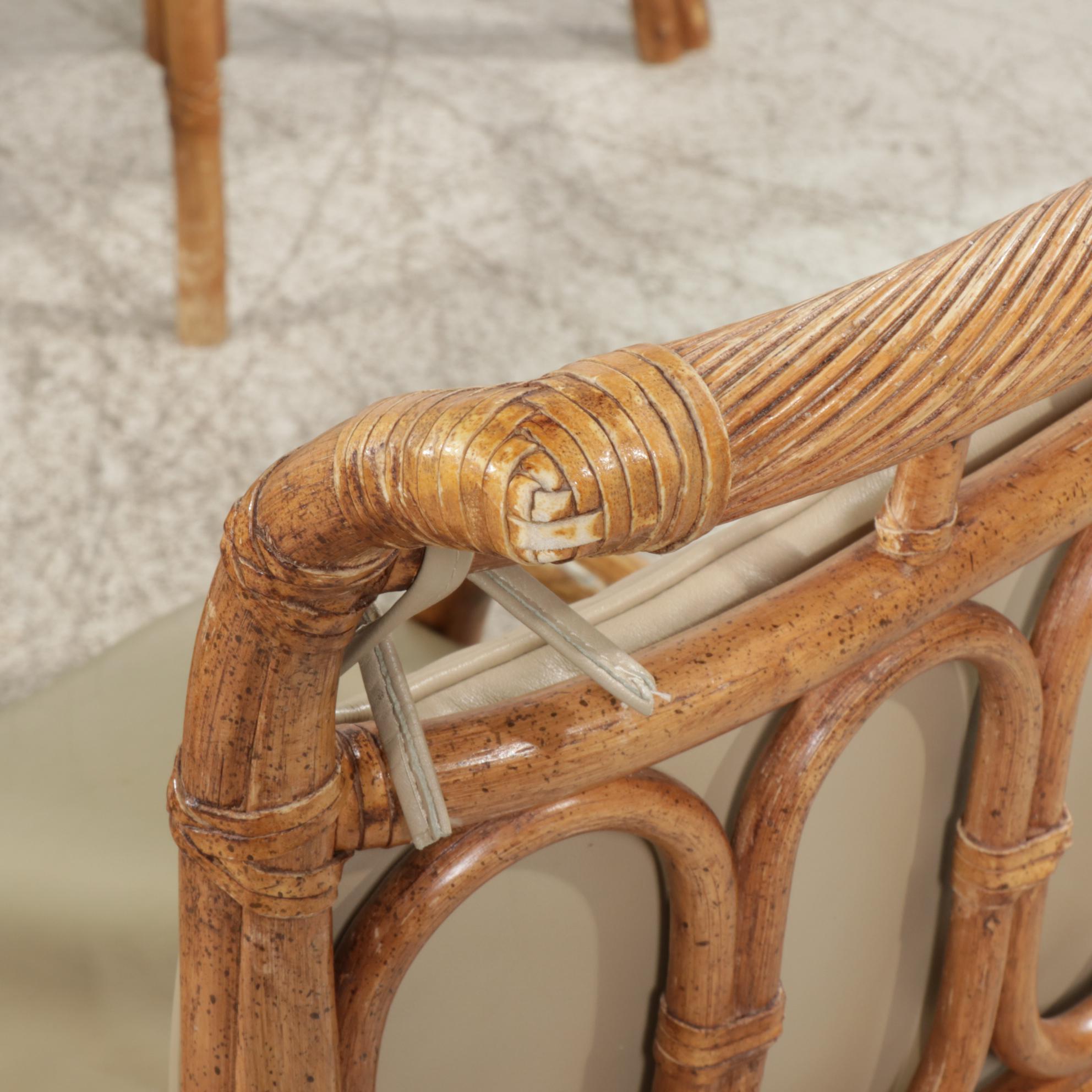 Rattan and Glass Top Dining Table and Four Chairs