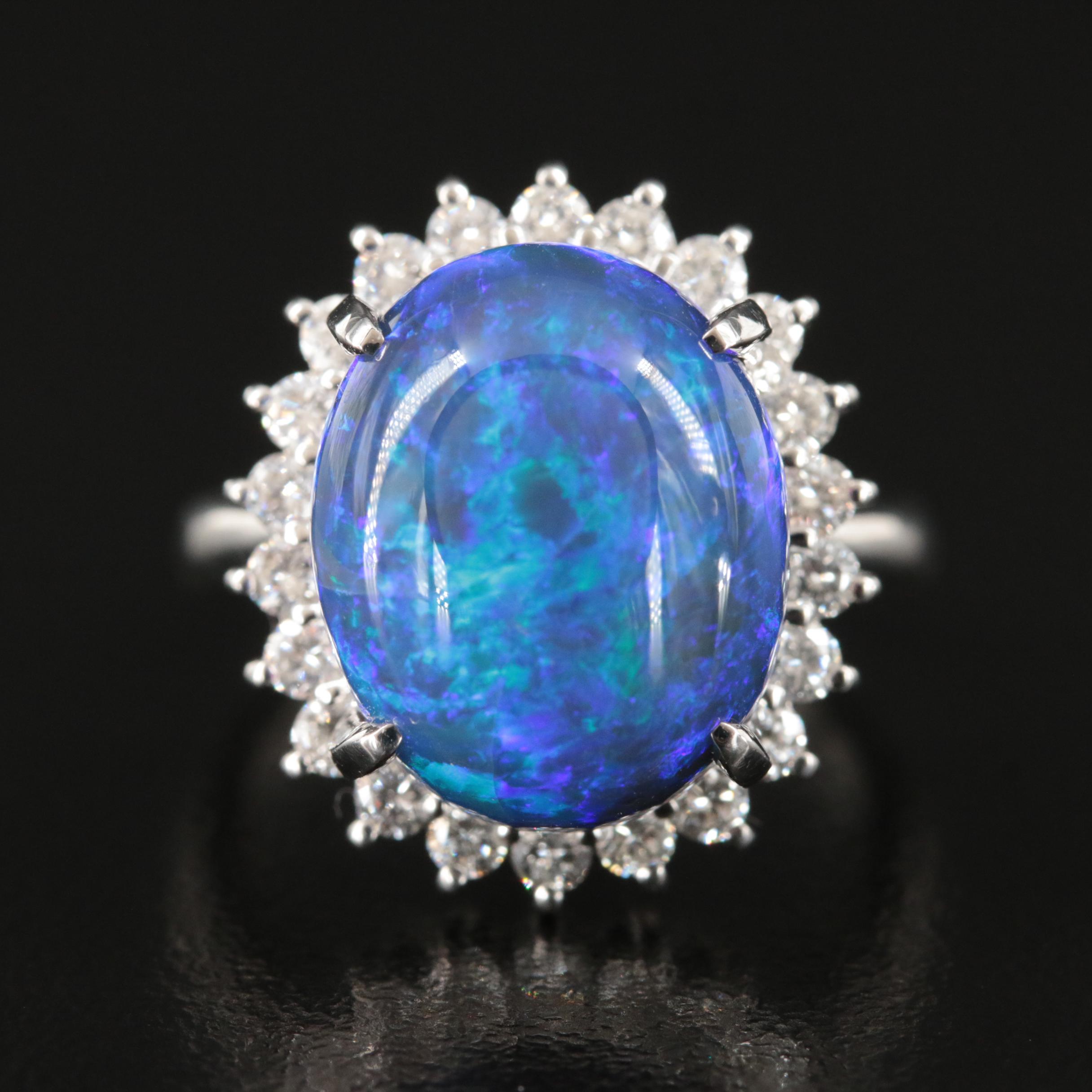 Platinum 10.16 CT Black Opal and Diamond Halo Ring