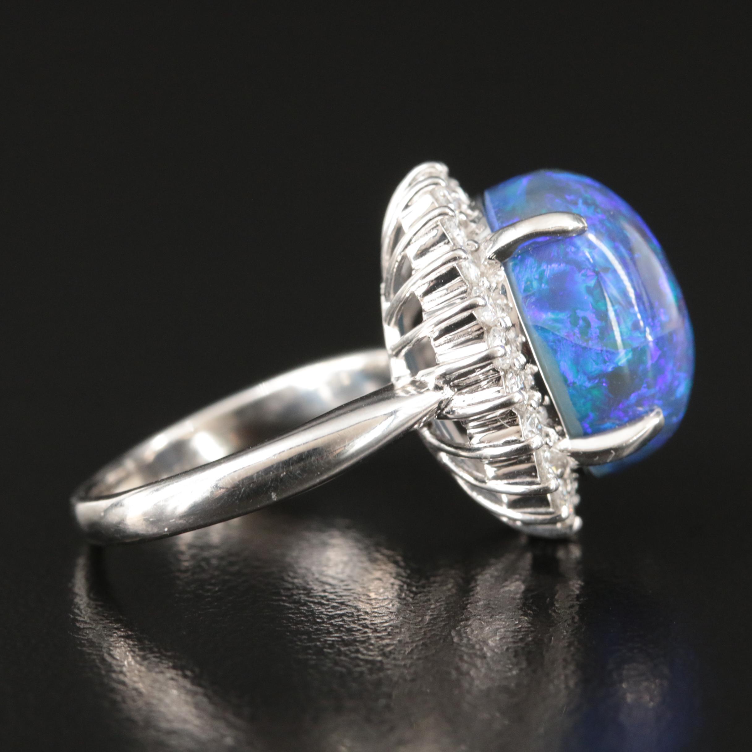 Platinum 10.16 CT Black Opal and Diamond Halo Ring