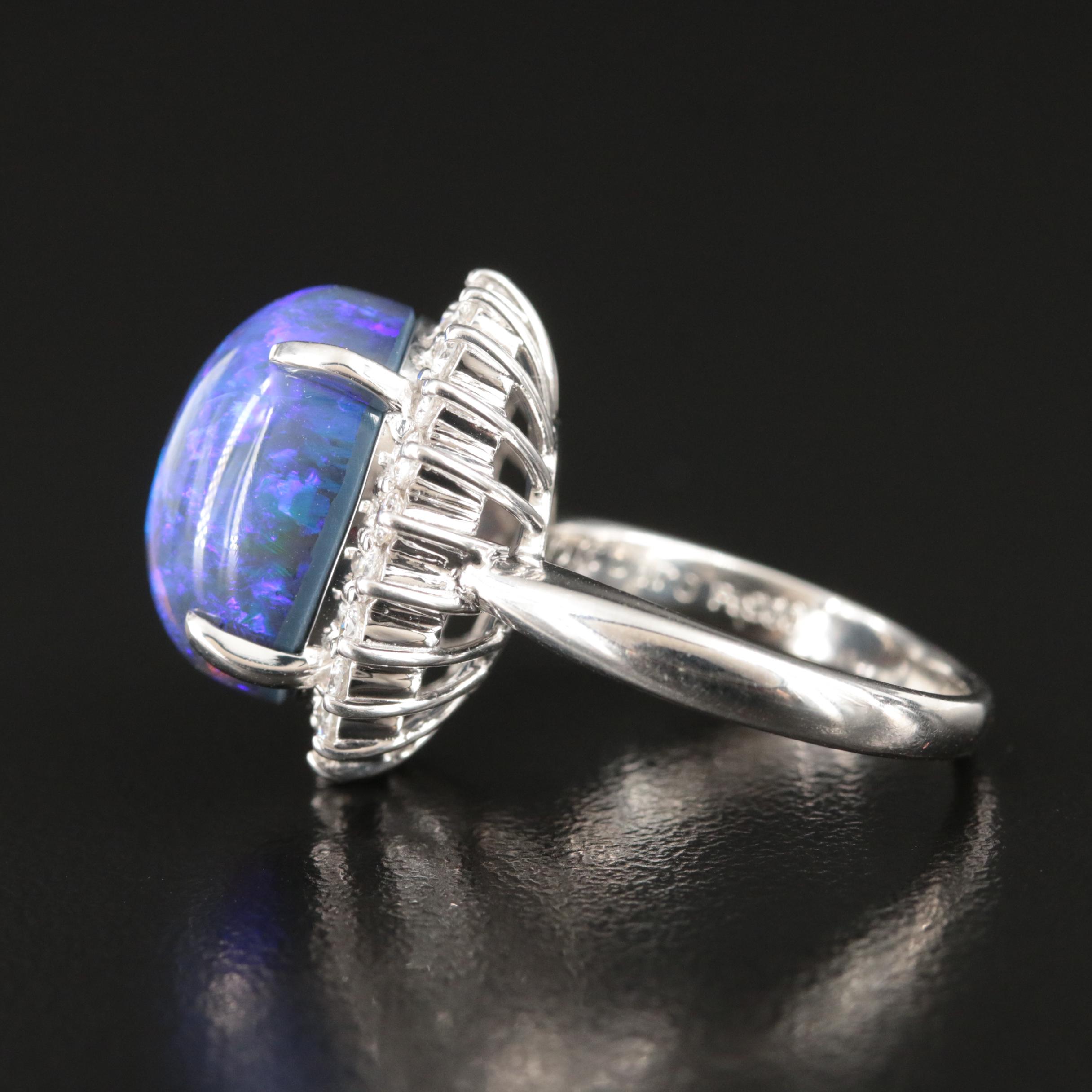 Platinum 10.16 CT Black Opal and Diamond Halo Ring