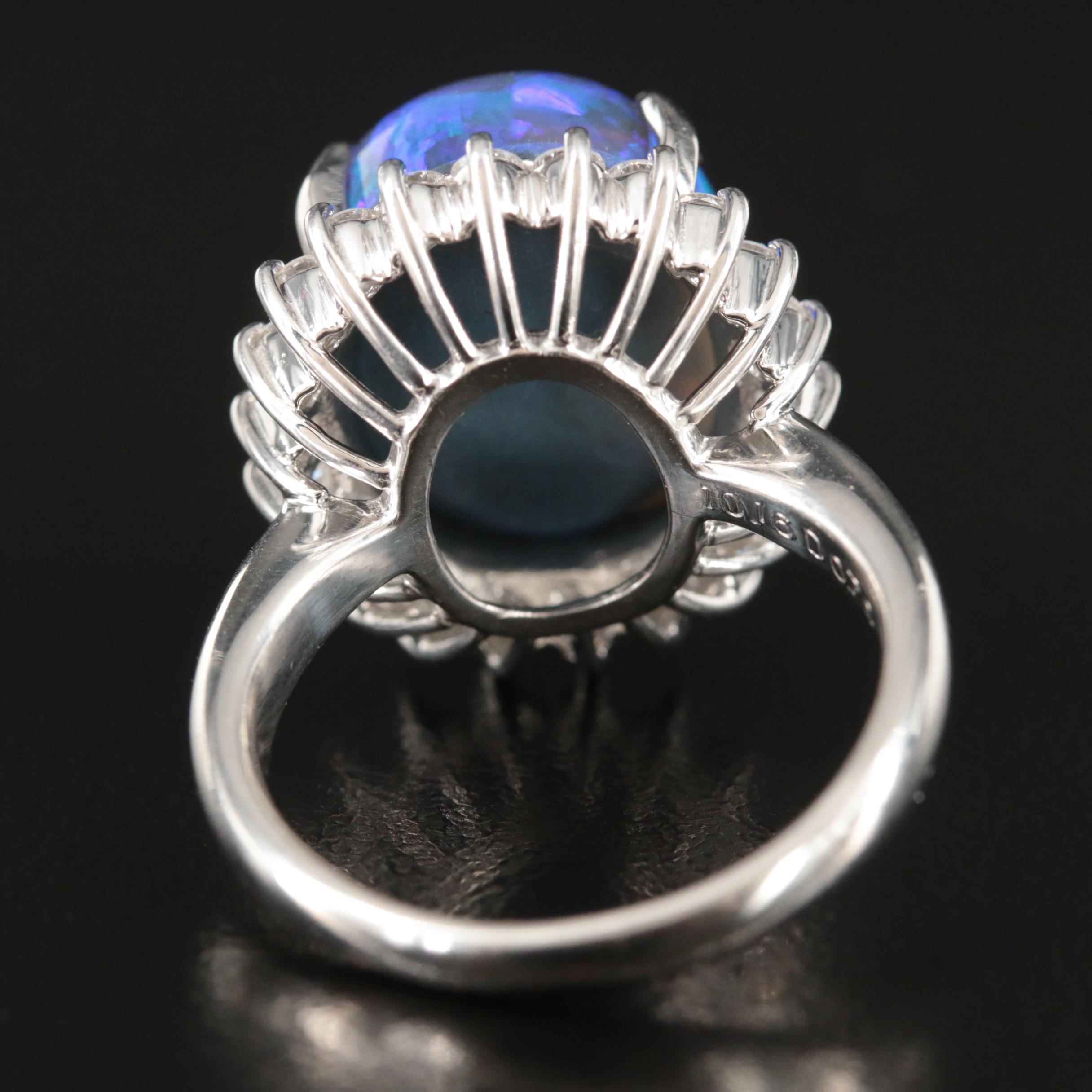 Platinum 10.16 CT Black Opal and Diamond Halo Ring