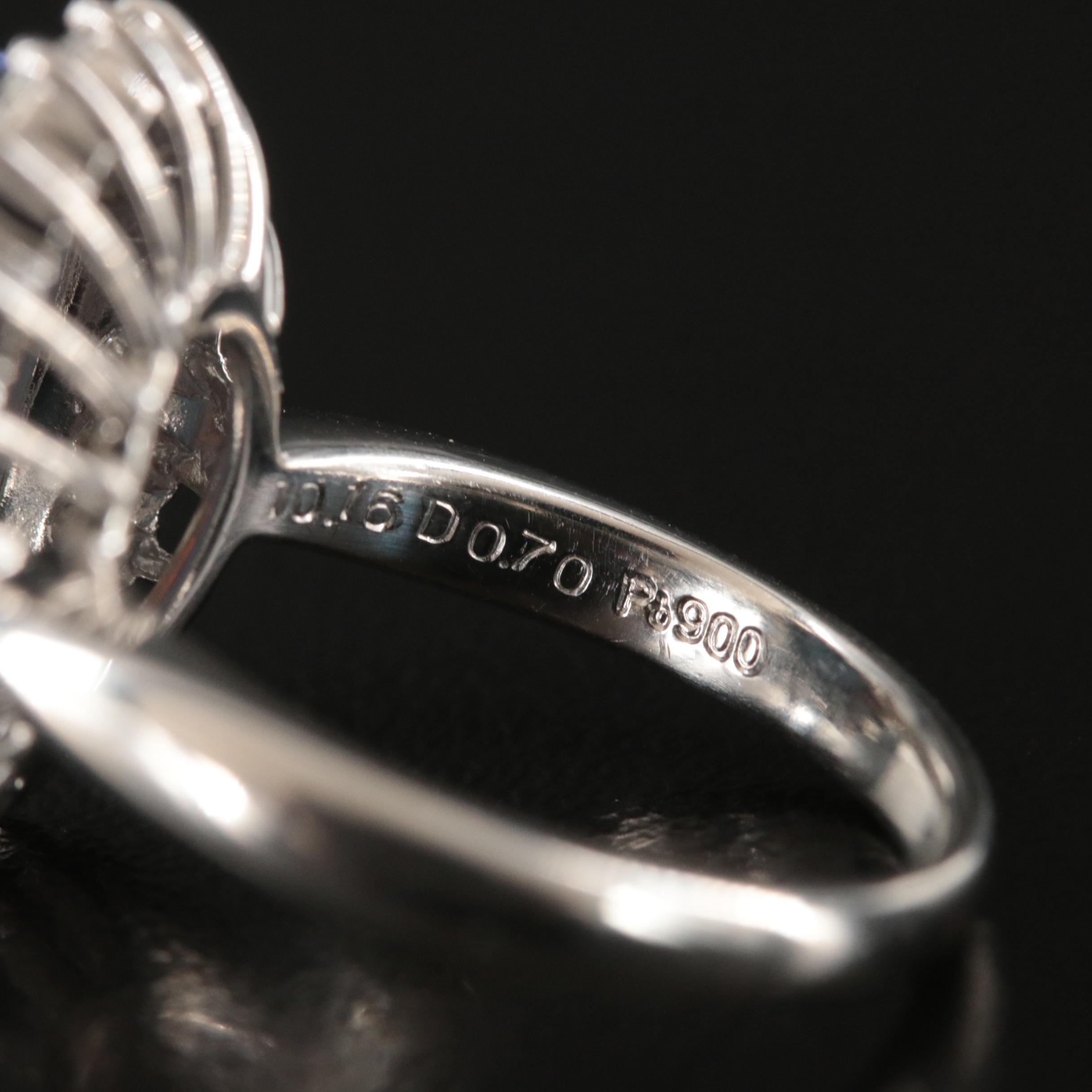 Platinum 10.16 CT Black Opal and Diamond Halo Ring