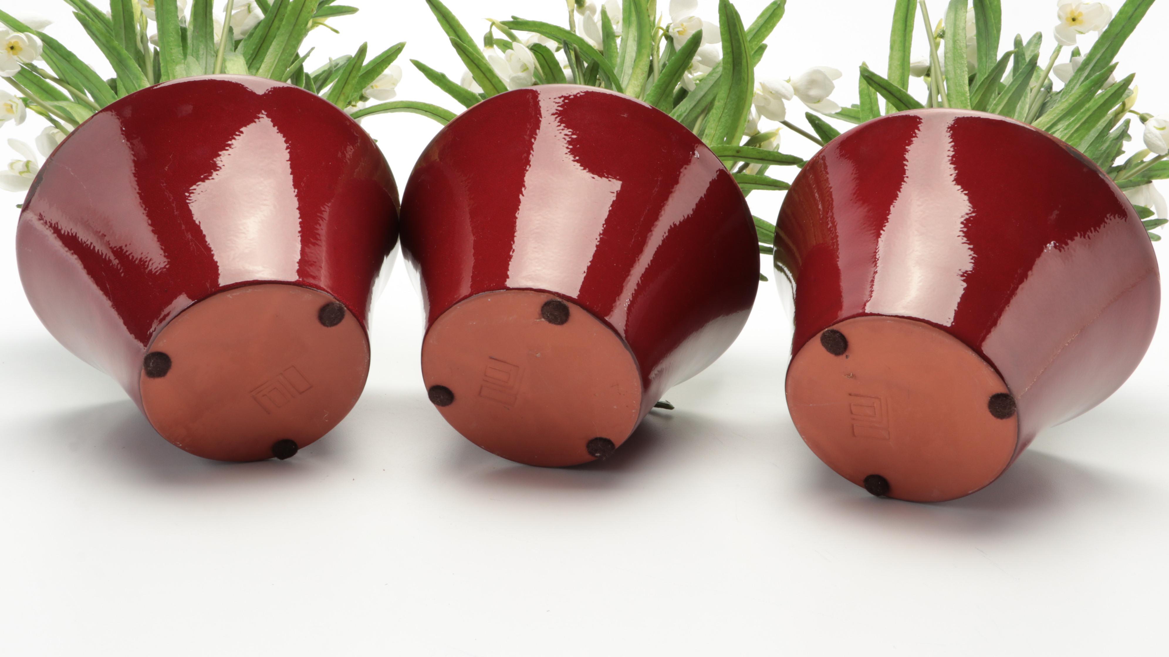 Artificial Greenery in Planters and Other Faux Plant Arrangements