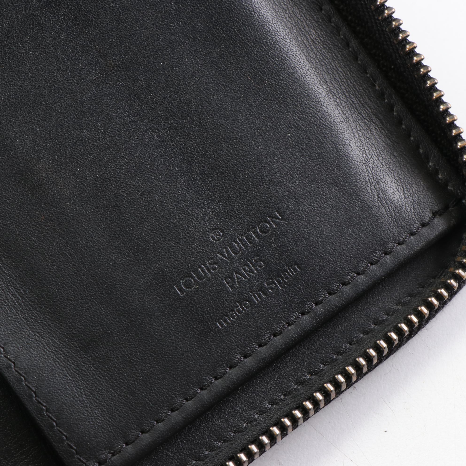 Louis Vuitton Zippy Vertical Wallet in Damier Infini Leather