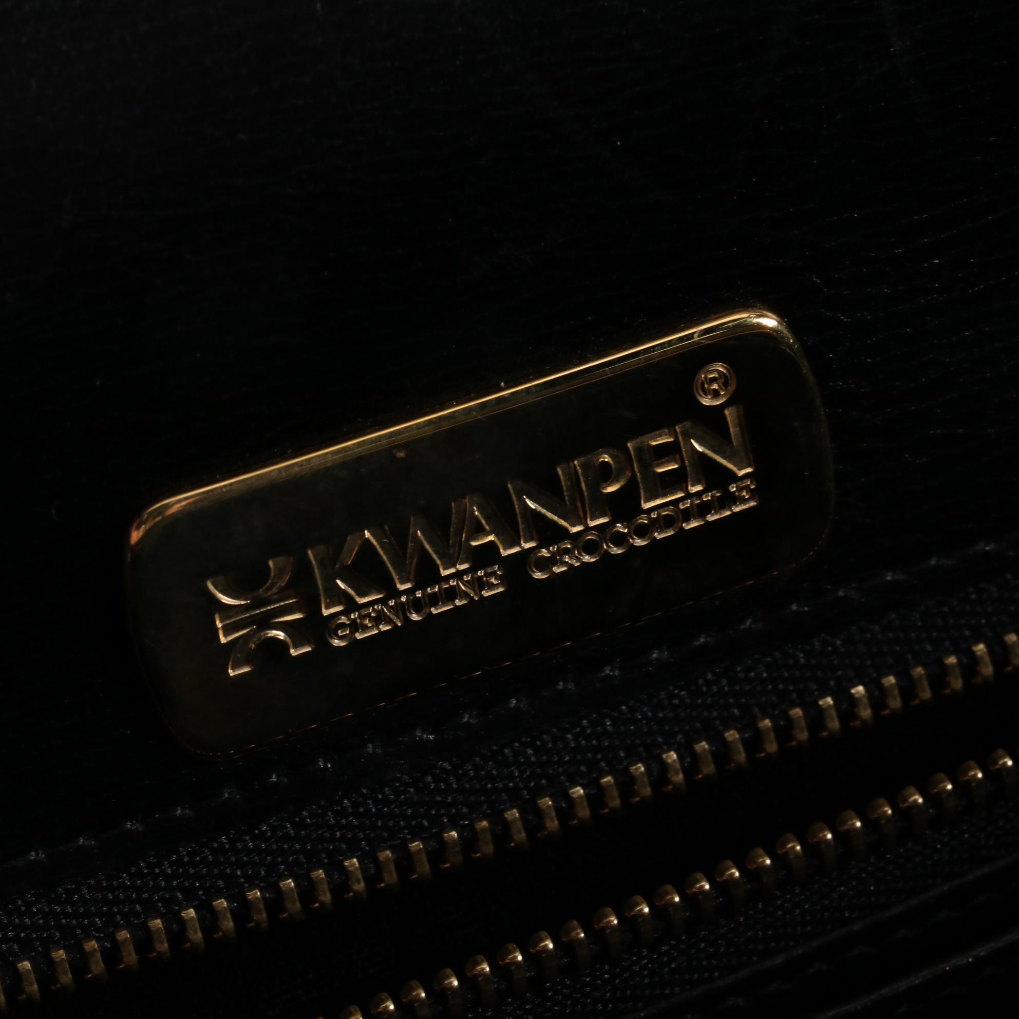 Kwanpen Belted Two-Way Bag in High Gloss Crocodile Skin Leather