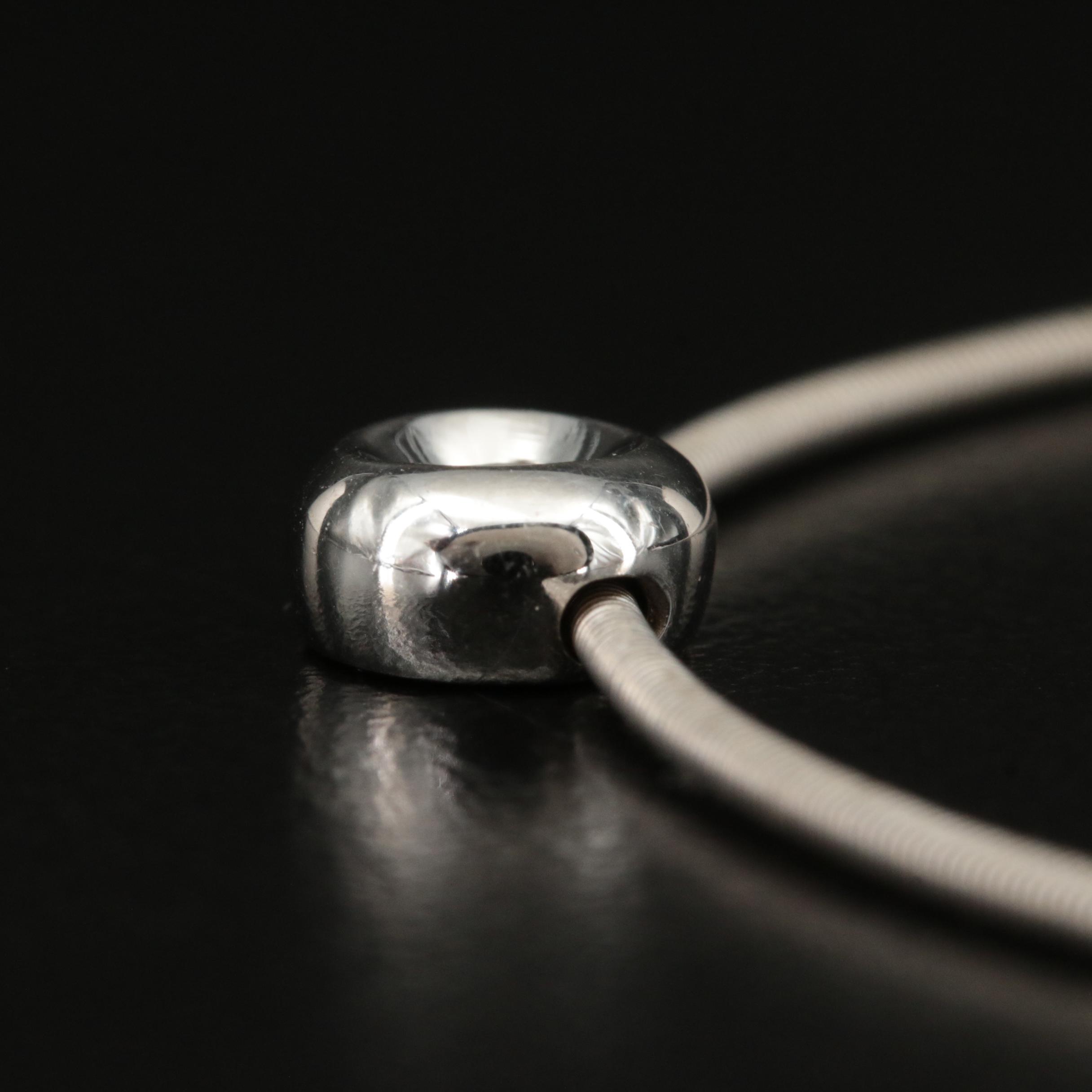 18K 0.12 CT Diamond Solitaire Pendant on Snake Chain